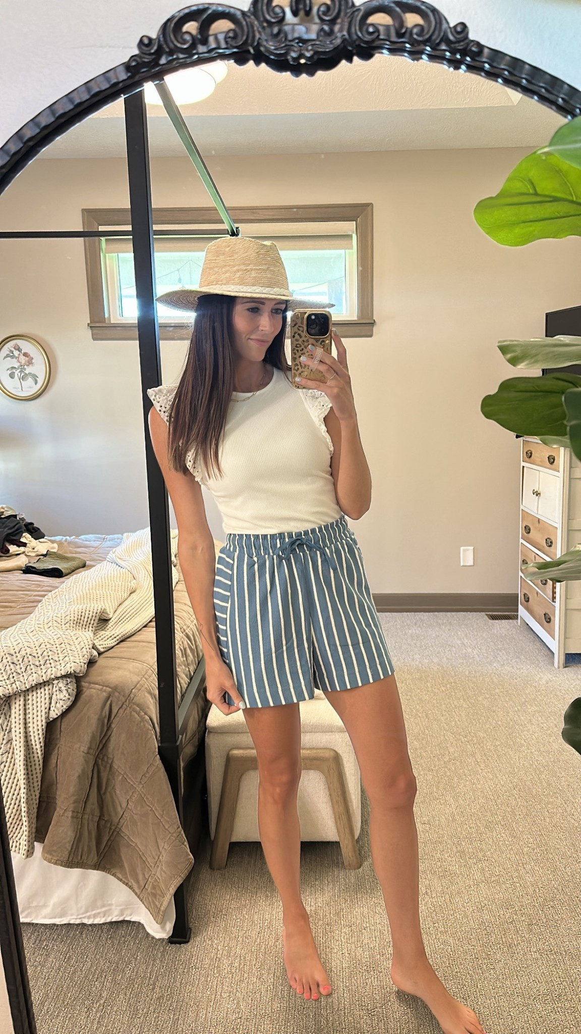 White tank
Blue and white casual shorts
Sun hat


#LTKSeasonal #LTKFindsUnder50
