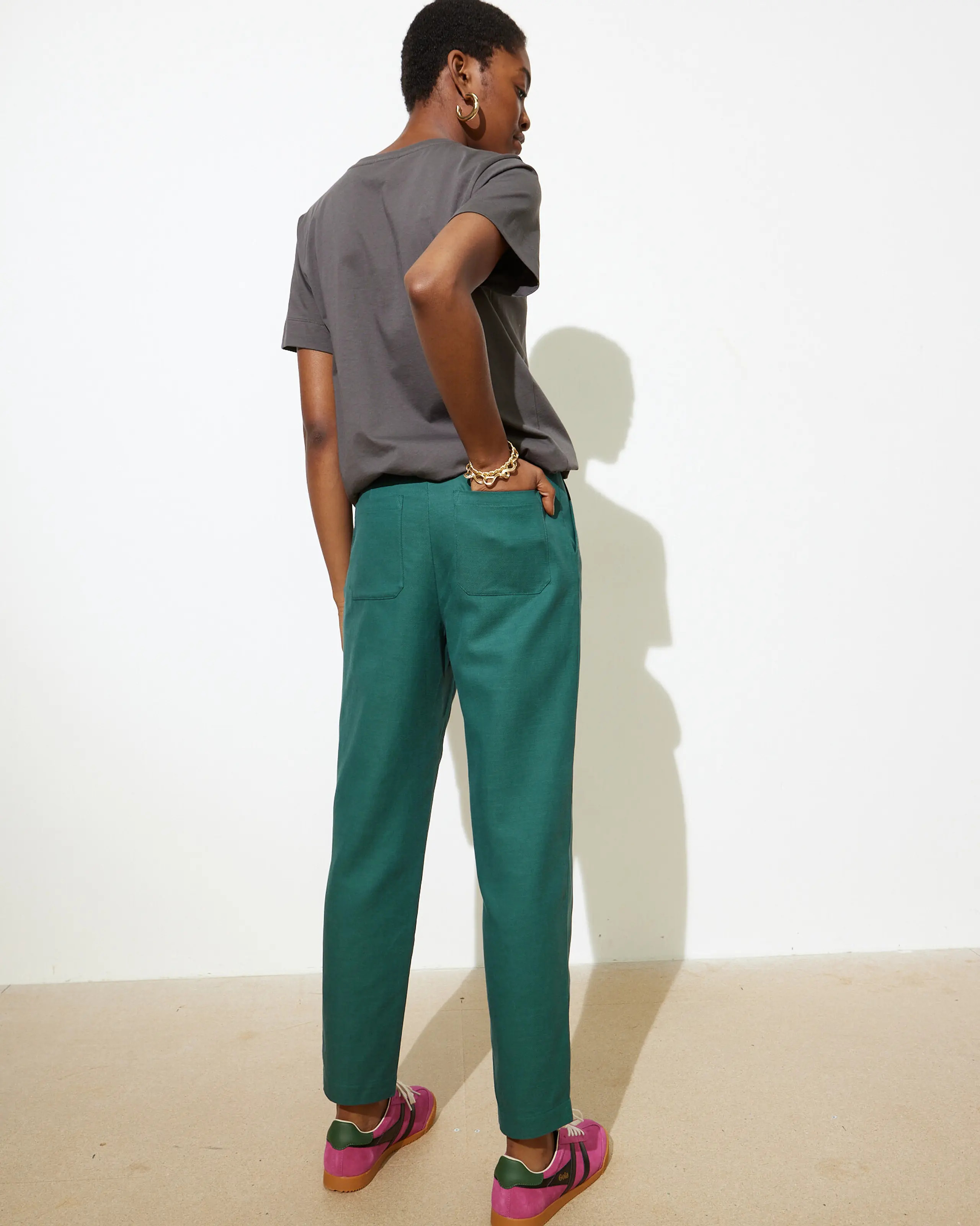 Teal Green Pleated Peg Tapered Trousers | Oliver Bonas | Oliver Bonas (Global)