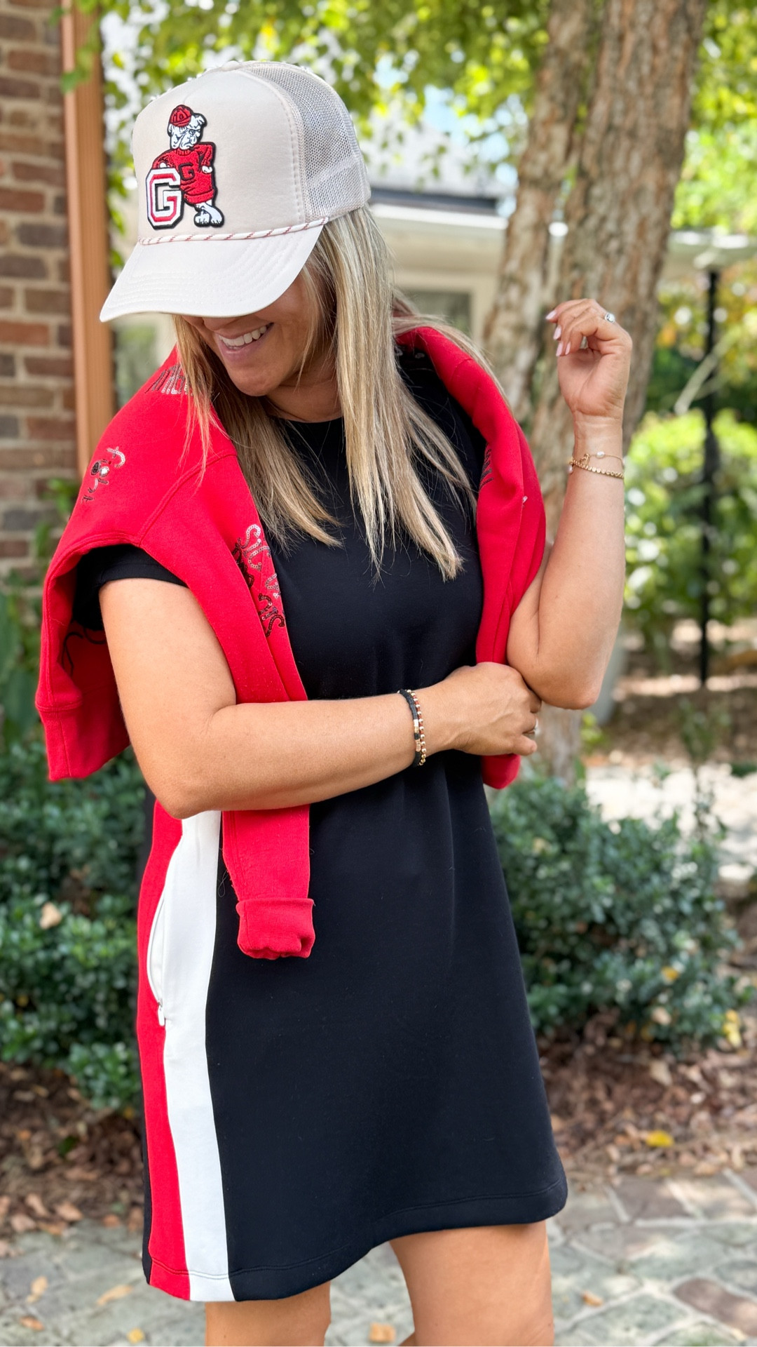 Dress- tts, wearing a small (and it’s on sale!)
Sweatshirt- Stewart Simmons (use code Claireeliselock) 
Hat- golden eye truckers 