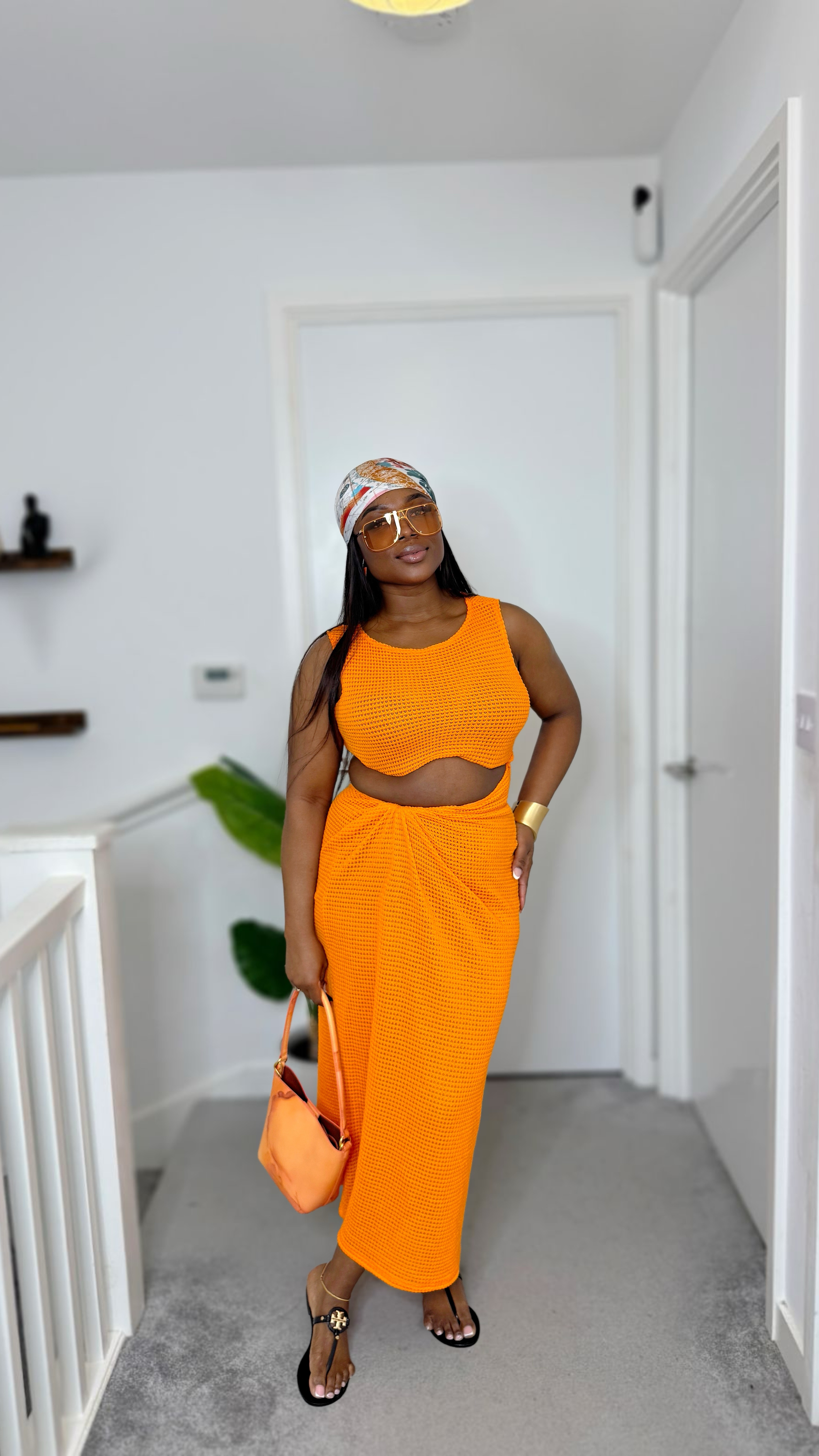 Vacation vibes unlocked 
Serving effortless glam in this sleeveless cut-out maxi dress — breezy, chic, and perfect for golden hour. Paired with comfy flats, a statement bag, sunnies, and a silky scarf for that timeless holiday feel. 🌞🌴👒

#LTKtravel #LTKsummer #LTKstyletip
