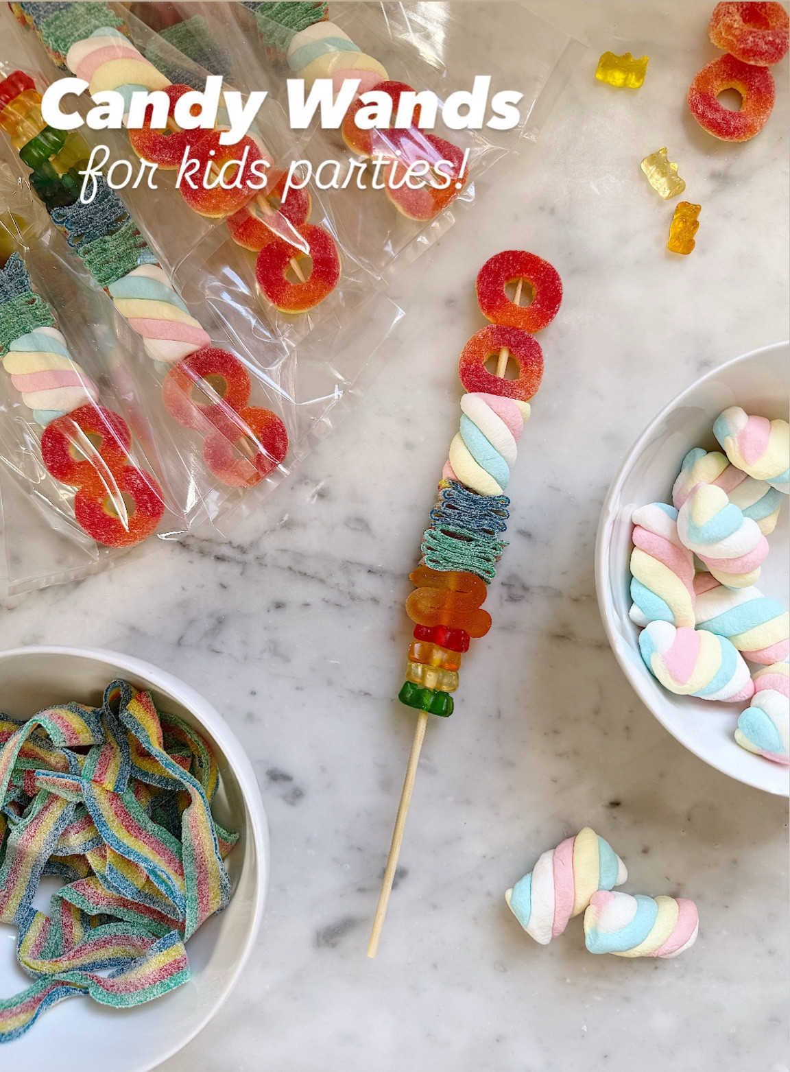 I made candy wands for my daughter’s 8th birthday—note the ‘8’ made of peachy rings at the top—and they were a huge hit with the kiddos! Candy skewers go for quite a bit on Etsy, so I decided to make them at home and you can too!

My biggest tip in making these is to soak the wooden skewers in water prior to sliding on the candy on. If you skip this step, the gummies won’t slide on easily and may tear before they make it into place. 

I placed the skewers in a 9x13 glass baking pan filled with a 1/2” of water and let the skewers soak for 10 minutes. Then I pulled them out one at a time wiping them off with a paper towel or lint-free cloth before skewing the candy on. #kidsparty #kids 

#LTKFamily #LTKKids #LTKParties