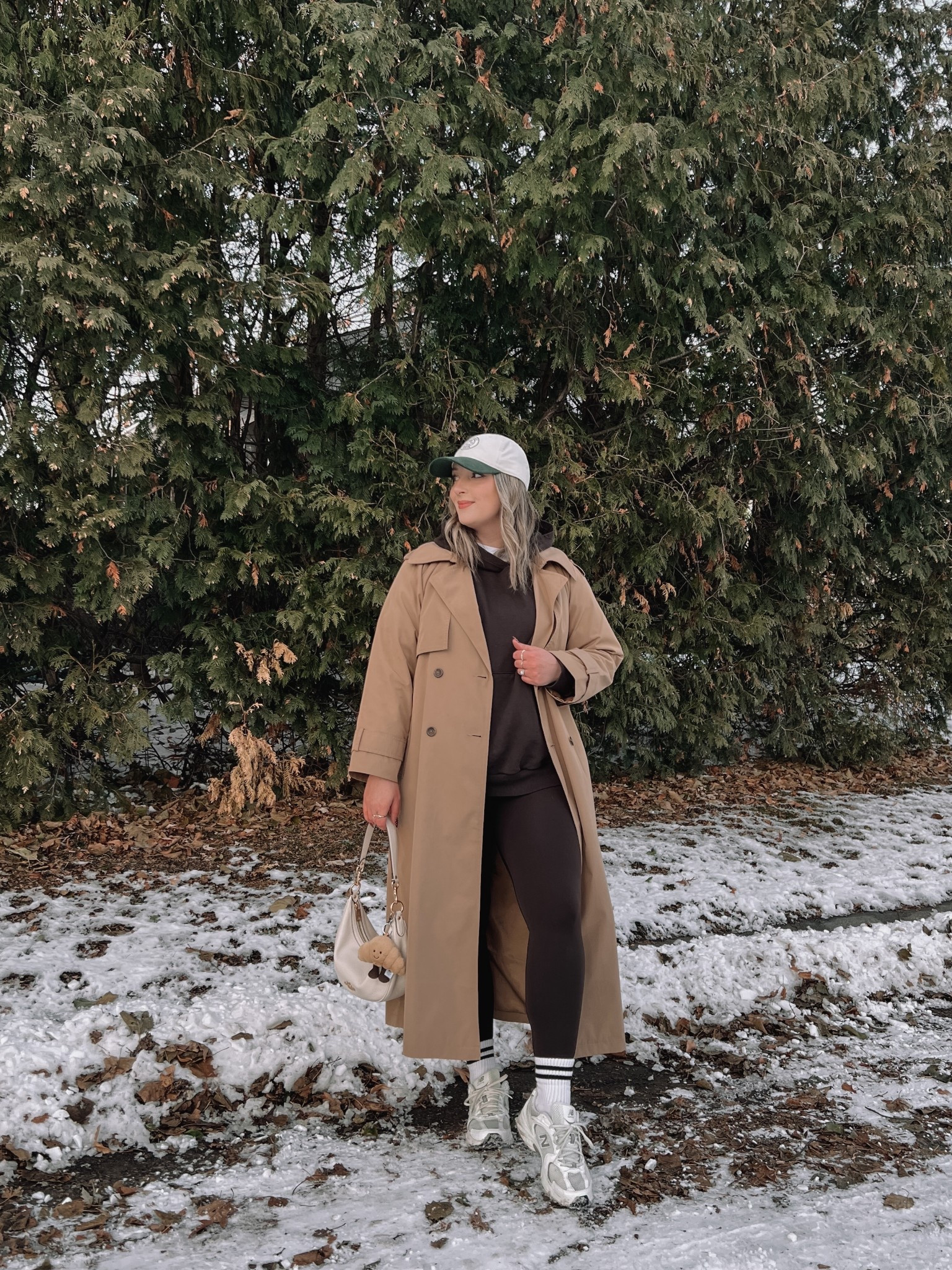 Casual winter outfit on sale! Wearing my usual size L in the leggings. Sized down to M in the hoodie, it runs big! Both are in the color “deep earth”. Linked this year’s version of my trench coat, wearing my usual L. Sneakers are so comfy for walking, but run a little big. I’m a 9.5-10 shoe and wear a 9 in these

#LTKmidsize #LTKwinter #LTKsale