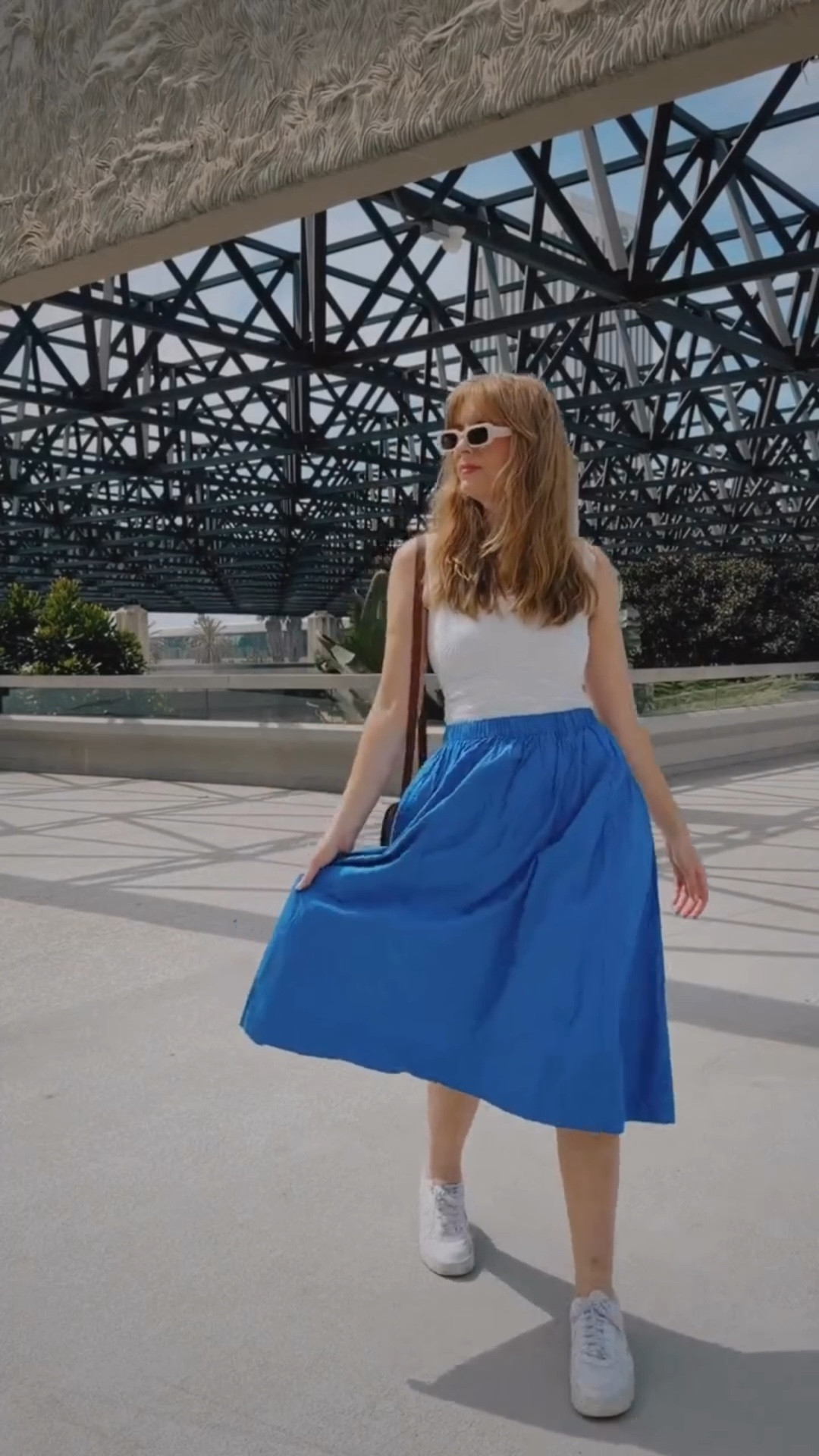 For a beautiful spring day, I decided to give this new bright blue midi skirt a twirl 💙 #ootd #springfashion #oufitideas