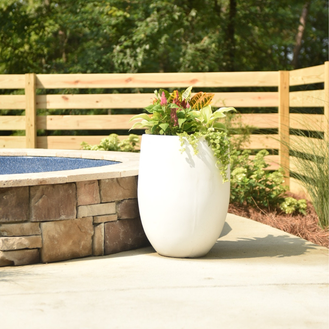 We love these large white planters! They have held up great over the years!!

#LTKSeasonal #LTKunder100 #LTKhome