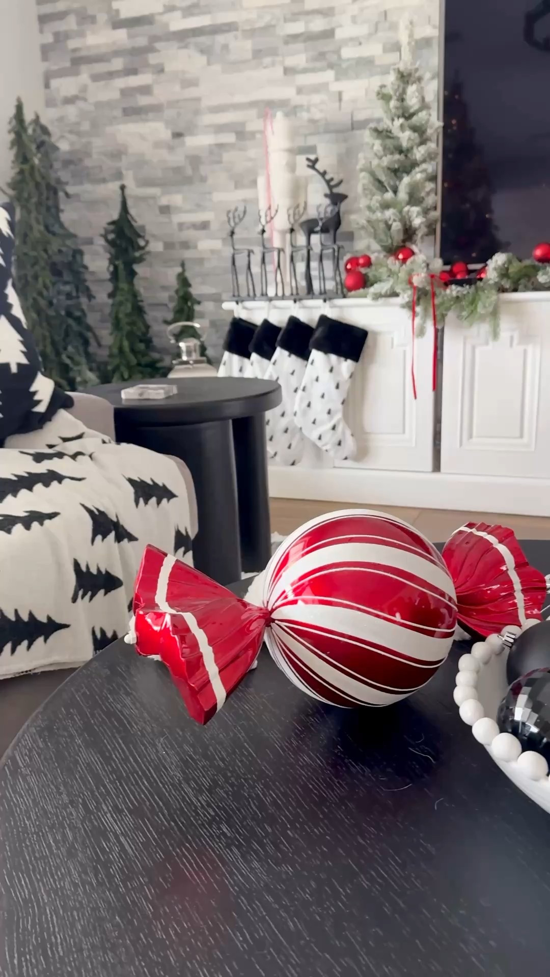 Christmas decor wood coffee table black wood rug Christmas tree 

#LTKHome #LTKHoliday #LTKSeasonal