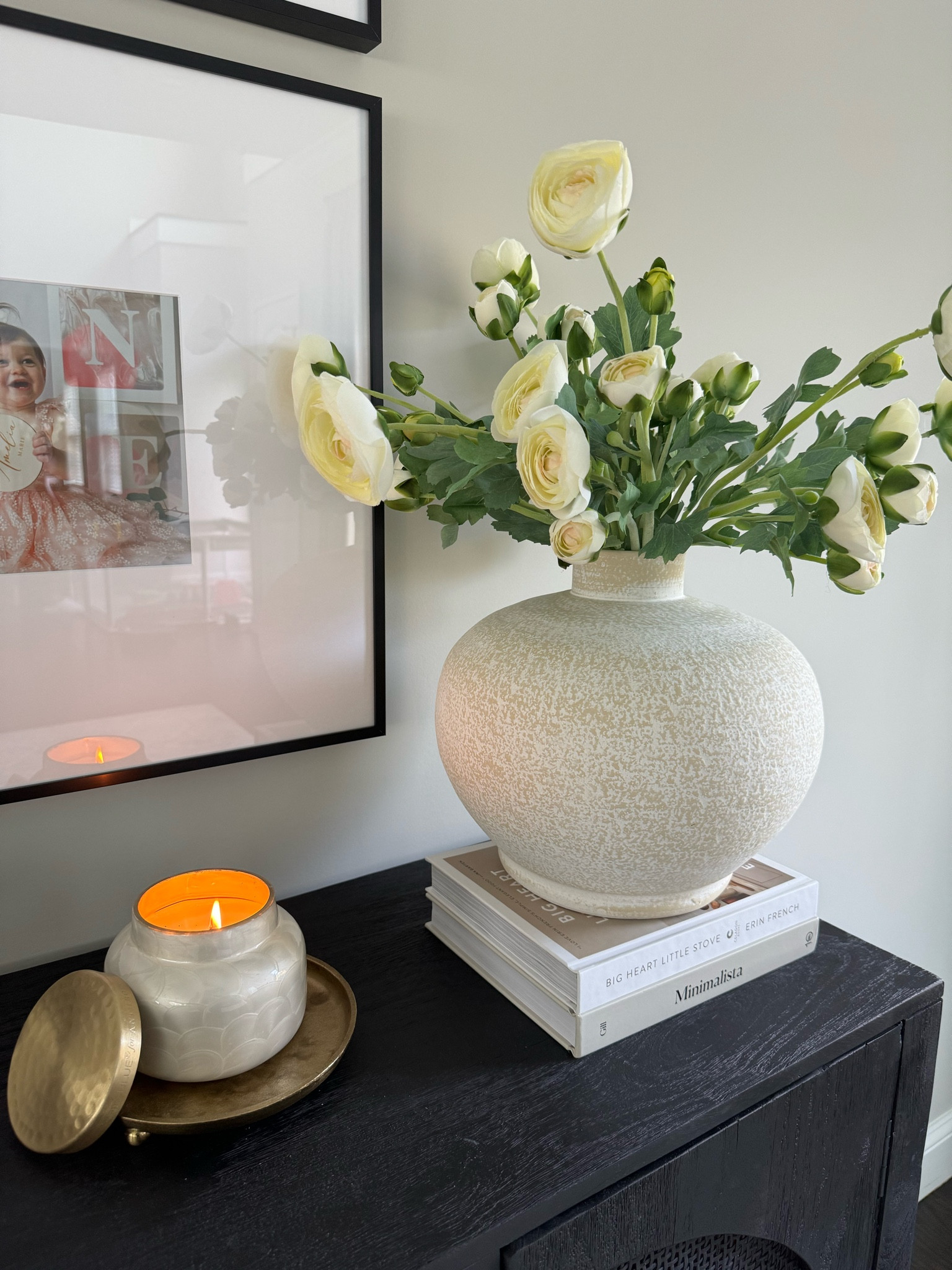 Console table and cabinet styling 🤍

Ceramic face, spring florals, gold, medal tray, anthropology, candle, neutral homestyle 

#LTKSeasonal #LTKxTarget #LTKhome