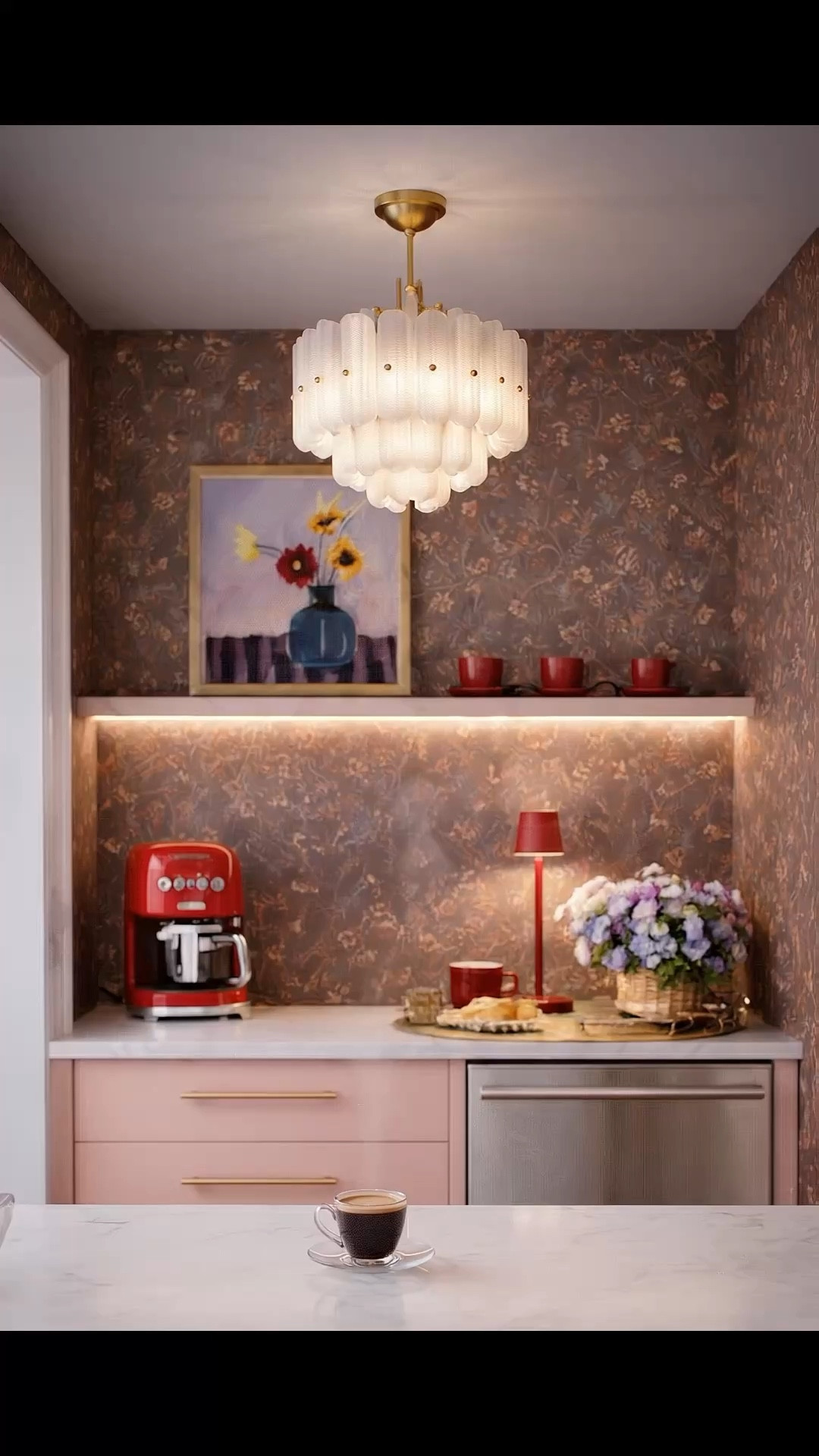 Creating a cozy, relaxing — yet elevated — coffee corner at home.

I love a moody wallpaper moment — it instantly brings depth and a quiet sense of luxury. Paired with a sculptural mini pendant, it creates the most intimate glow.

Styled with a curated artwork, a sleek coffee maker, and a hint of a drawer fridge for that seamless functionality. Finished with a small rechargeable table lamp, a simple tray, and delicate coffee cups — everything feels intentional, warm, and refined.

#CoffeeStation #CoffeeCorner #CoffeeMaker #CoffeeCup #DrawerFridge #Artwork #Wallpaper #RechargeableLamp #TableLamp #FlowerArrangement #TrayDecor #ShelfStyling #KitchenStyling #HomeCoffee 

#LTKHome #LTKFestival #LTKHome #LTKdayinmylife