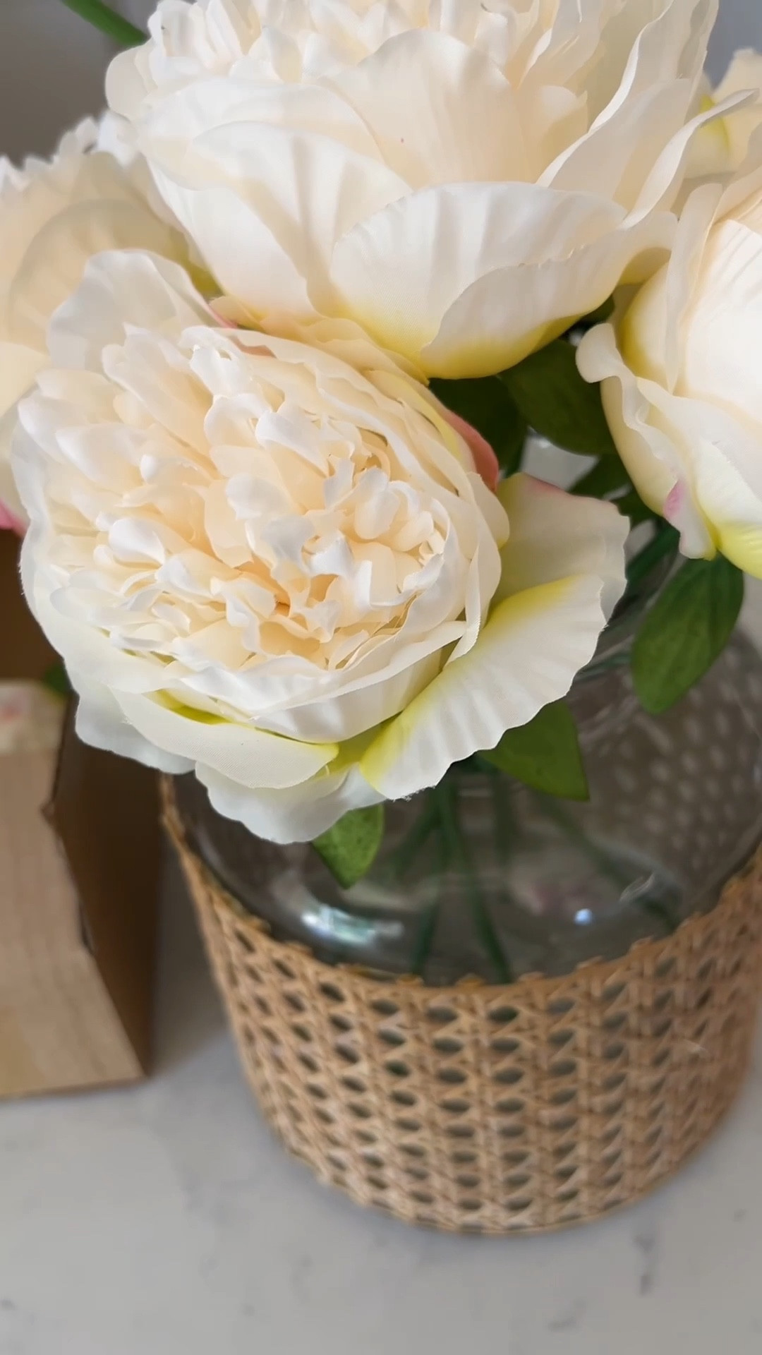 These faux peonies in a cane-wrapped vase are my go-to for effortless coastal decor and year-round floral styling. I love how the soft blooms paired with natural texture add warmth, height, and a designer-inspired coastal look to shelves, consoles, and tables. 

#LTKU #LTKSaleAlert #LTKHome