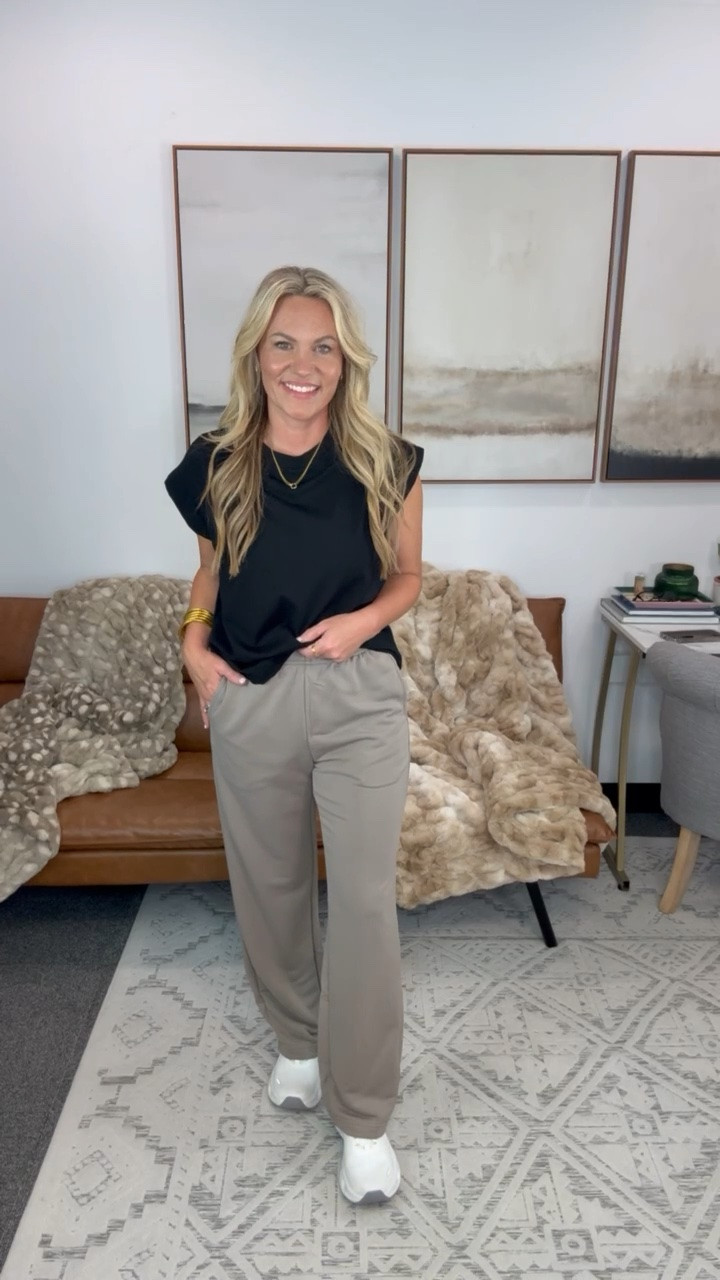 I wasn’t sure these pants would become such a staple, but they’ve earned a permanent spot in my closet. The fabric is soft with a relaxed drape, the elastic waistband is comfortable enough for all day wear, and the straight leg keeps them looking more elevated than your average lounge pants. I swapped my built in bra tank for this black tee and it completely changed the look without sacrificing comfort.

Elastic waist pants, straight leg trousers, black tee outfit, comfortable everyday style, neutral outfit, casual chic, travel outfit, lightweight pants, athleisure style, fall transition outfit, AudrieDollins

#LTKActive #LTKootd #LTKTravel