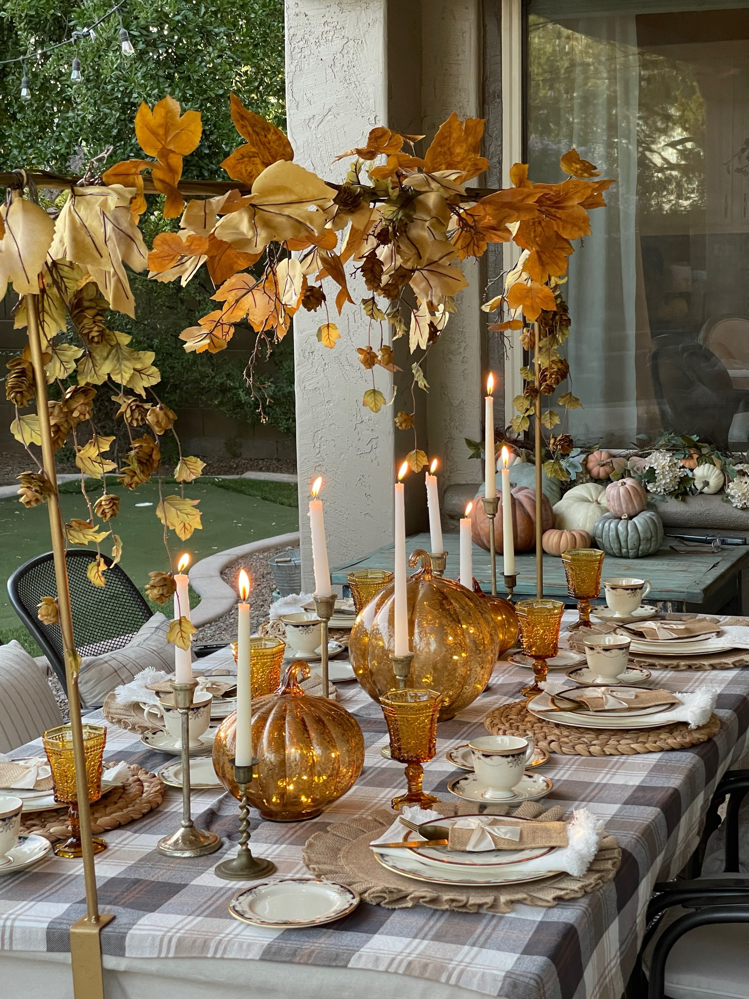 An alfresco Fall table which includes my beloved table rod, cozy candles, Fall leaves and glowing glass pumpkins (from Balsam Hill) 

#falldecor #pumpkinseason #falltable

#LTKSeasonal #LTKHome
