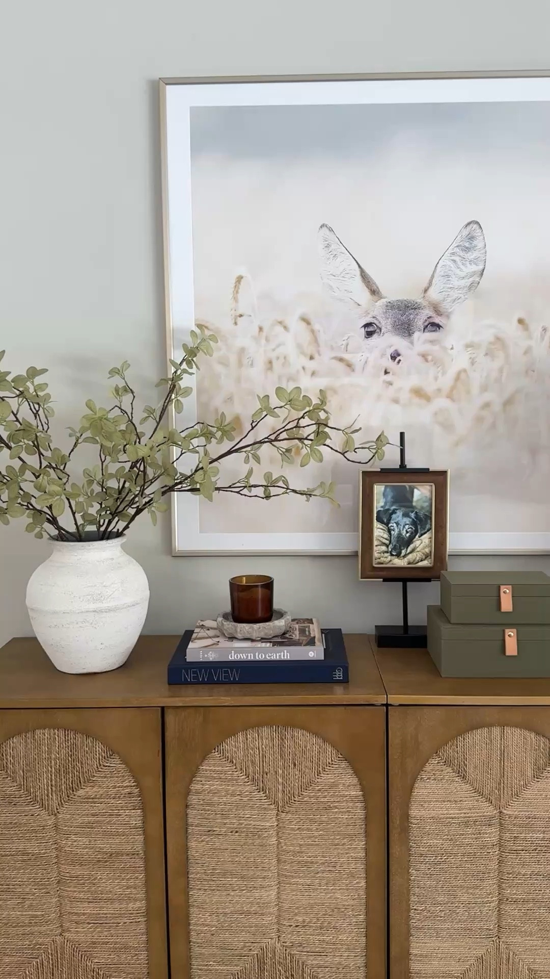 Console table refresh 🤎

I may switch this space up often, but one thing that never changes—my love for neutral, earthy tones that feel grounded and calm. This setup just *works*, especially with that stunning deer artwork tying everything together 🦌

Mixing greens, blues, and that gorgeous taupe-brown is always a yes for me… and adding a touch of spring greenery made it feel so fresh and alive 🌿

Absolutely in love with this little corner ✨ Shop everything linked!


#LTKHome