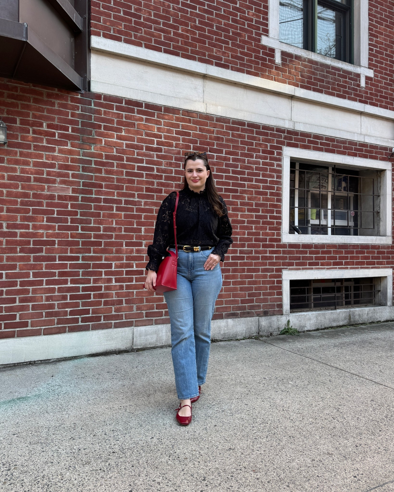 Easy denim spring outfit idea  A cool and effortless take on spring dressing with a black lace top, straight-leg jeans, and pops of cherry red with the leather bag and matching flats. The monochrome base with statement accessories keeps it timeless and chic.

#LTKSeasonal #LTKStyleTip #LTKFindsUnder100
