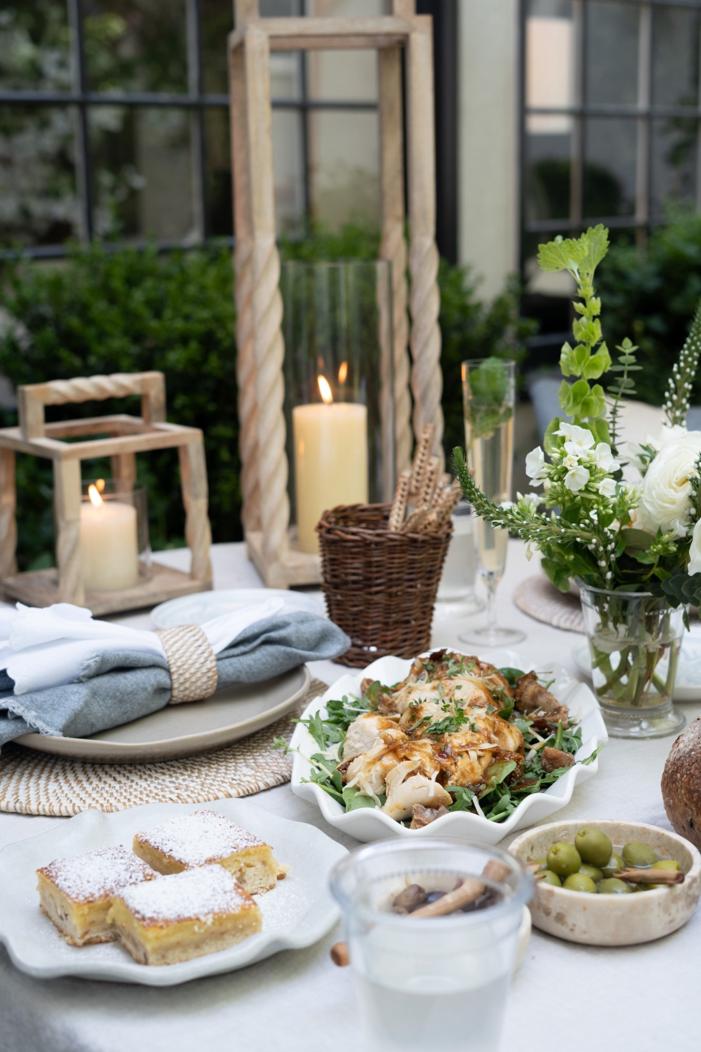 Guys, THIS is what a life well lived looks like! Twisted wood lanterns, scalloped serveware, garden flowers, and candlelight that makes everything glow. Add good food and even better company, and suddenly an ordinary evening becomes the moment you'll remember. Beautiful spaces aren't the dream—they make room for it! 

#LTKdayinmylife #LTKSeasonal #LTKHome