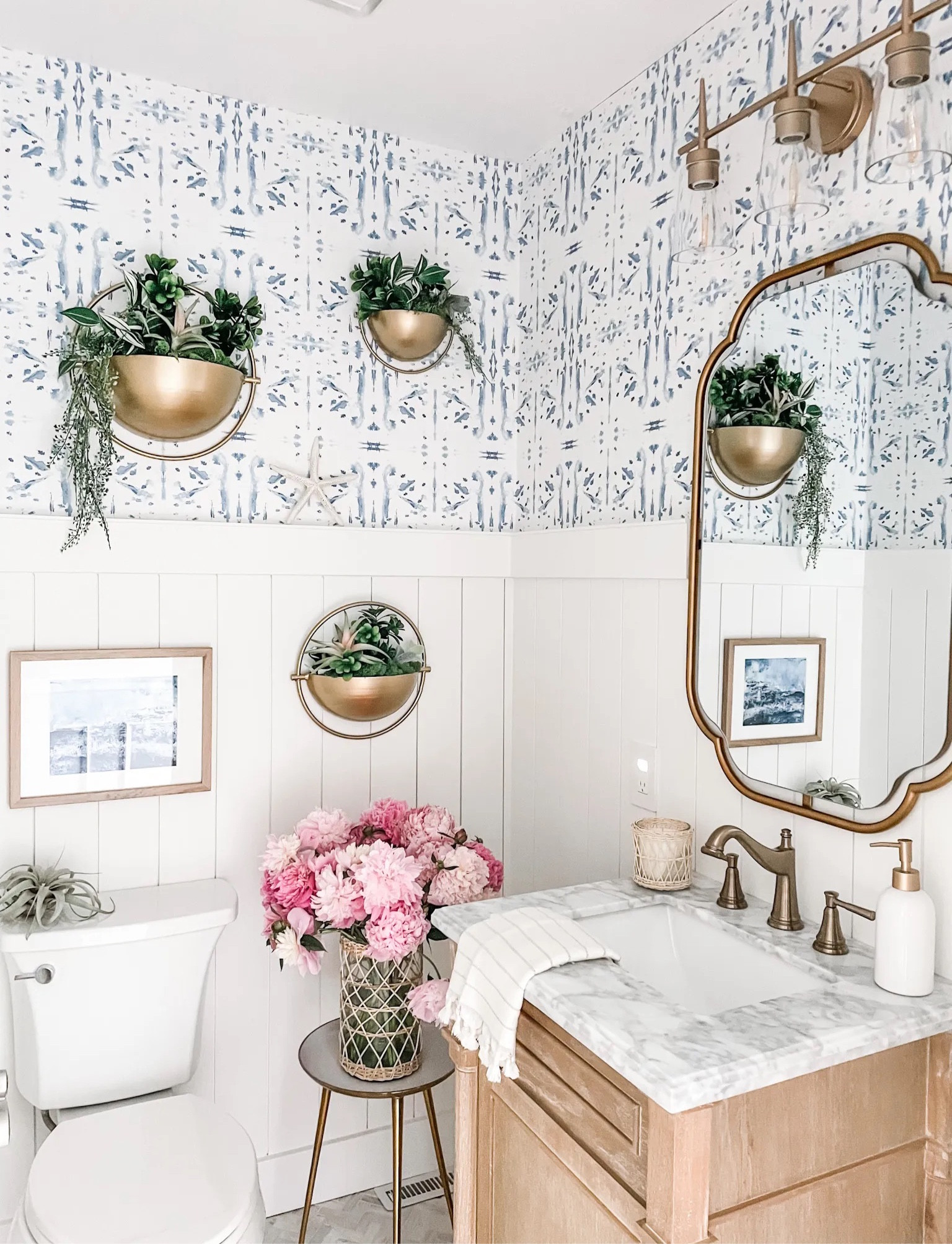 Our 3 piece wall planter set is a Way Day Deal!

Available in gold and black metal planters.
Powder room decor, wall art, wall planter, gold metal planter, wall basket planter, bathroom decor, natural wood vanity, gold wall mirror, Anthro mirror dupe, Kohler toilet, natural wood picture frame, soap dispenser, gold faucet, bathroom faucet, powder room hand towel, Turkish hand towel, bathroom vanity mirror, bathroom vanity light fixture, 3 light fixture for bathroom, herringbone tile, bathroom floor tile, coastal art, abstract art, wall art, coastal decor.
#bathroom #wayfair #powderroom

#LTKFind #LTKsalealert #LTKhome