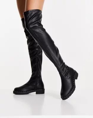 ASOS DESIGN Petite Kally flat over the knee boots in black | ASOS (Global)