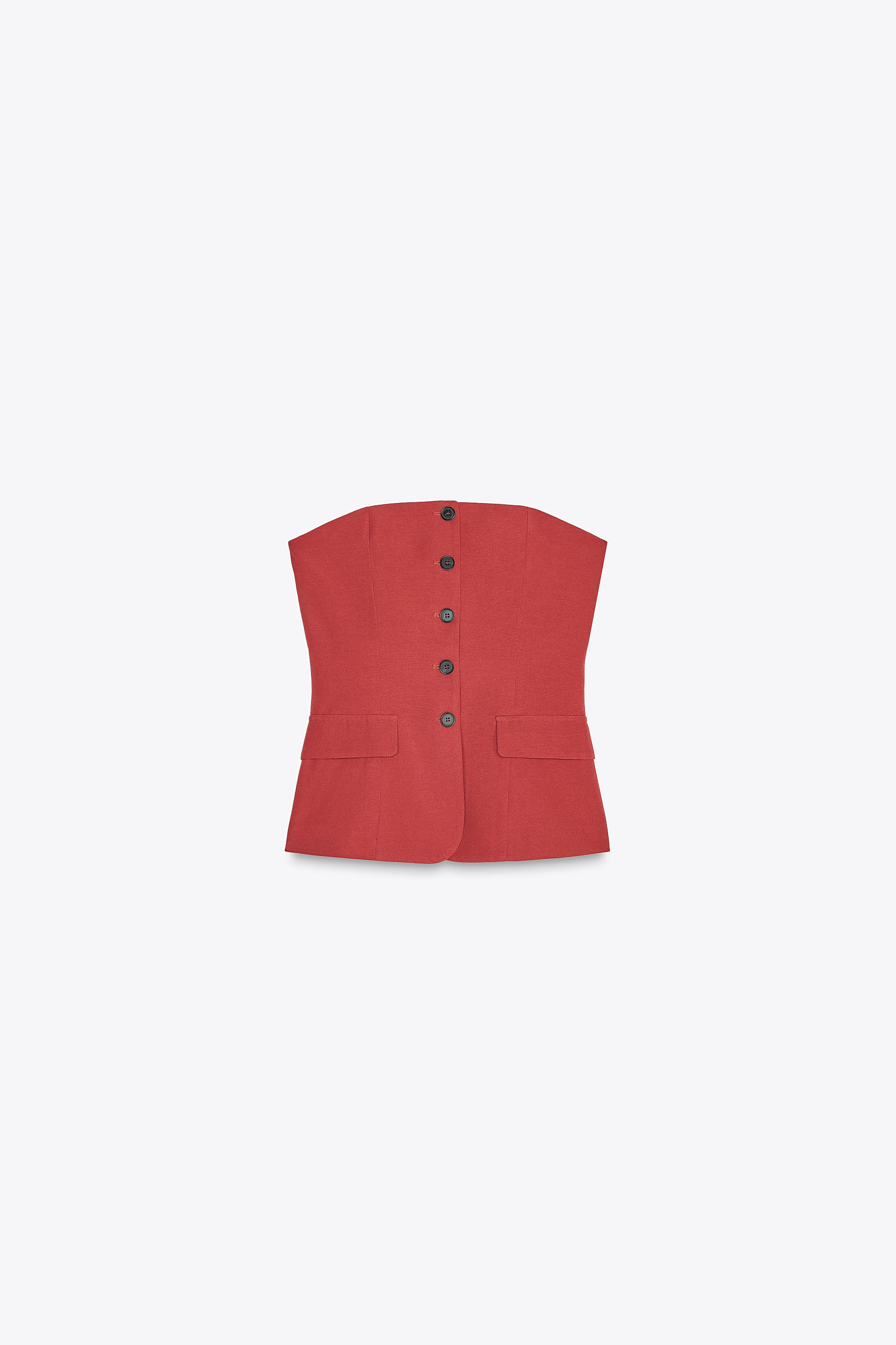 Strapless top with straight neckline. Front faux welt pockets. Lined. Front button closure. | Zara US