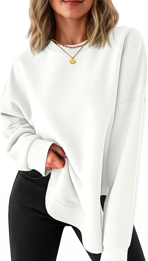 Fisoew Womens Crewneck Sweatshirts Casual Long Sleeve Side Split Hihg Low Curved Hem Shirts Loose... | Amazon (US)