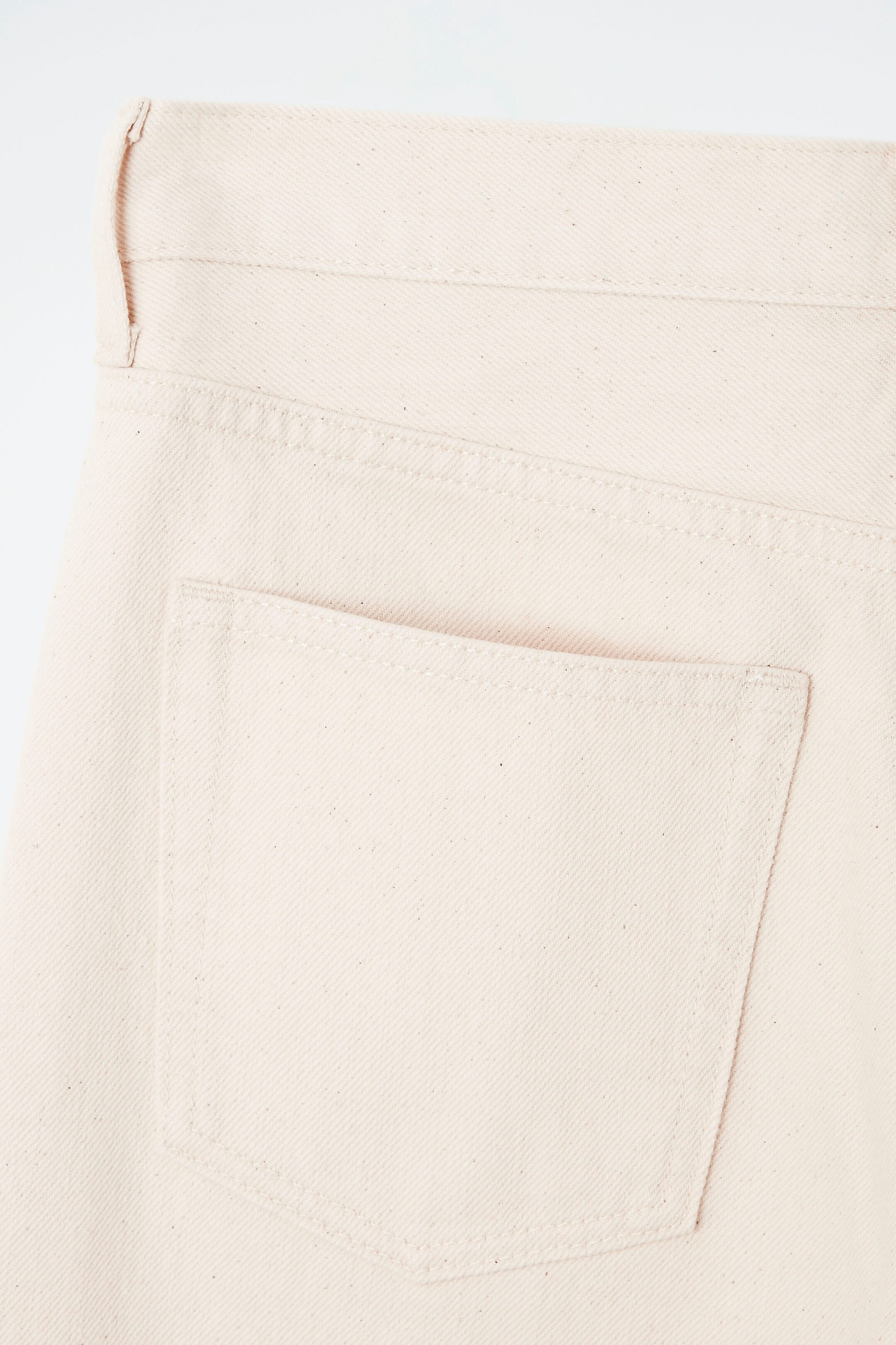 ARCH TAPERED JEANS - IVORY | COS (EU)