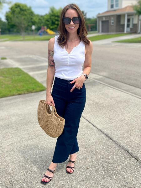 Neutral colors such as white and navy fill up the bulk of my wardrobe. These Colette cropped wide-leg pants are lightweight, figure-flattering and incredibly comfortable. They come in 10 colors! 
•
#anthropologie #summerstyle #navypants #navytrousers #neutraloutfit #amazonfind #amazonfashion #blacksandals #rattanhandbag #widelegpants 

#LTKitbag #LTKworkwear #LTKunder100