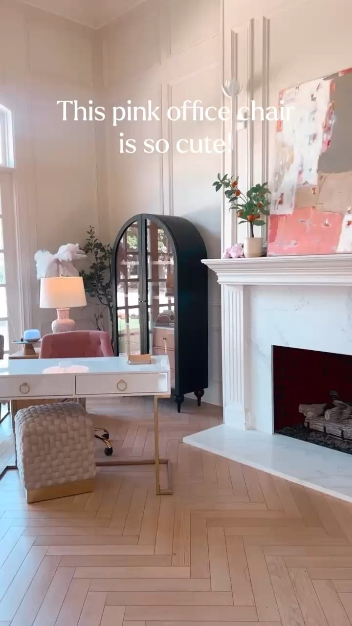 Office goals ✨ Creating a space that feels both functional and inspiring! Obsessed with this sleek desk, cozy textured ottoman, and pop of pink from the chair. Perfect for all the work-from-home vibes! Shop my office staples to elevate your workspace. 🖤 #LTKhome #OfficeInspo