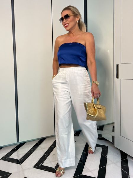 Spring | Summer Outfit
High Waisted Pull On White Linen Pants-Wearing a 25R
Royal Blue Satin Tie Back Elastic Top -Wearing a M and comes in so many colors!

#LTKfindsunder100 #LTKfindsunder50 #LTKsalealert