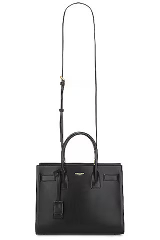 Saint Laurent Baby Sac De Jour Carryall Bag in Noir - Black. Size all. | FWRD 