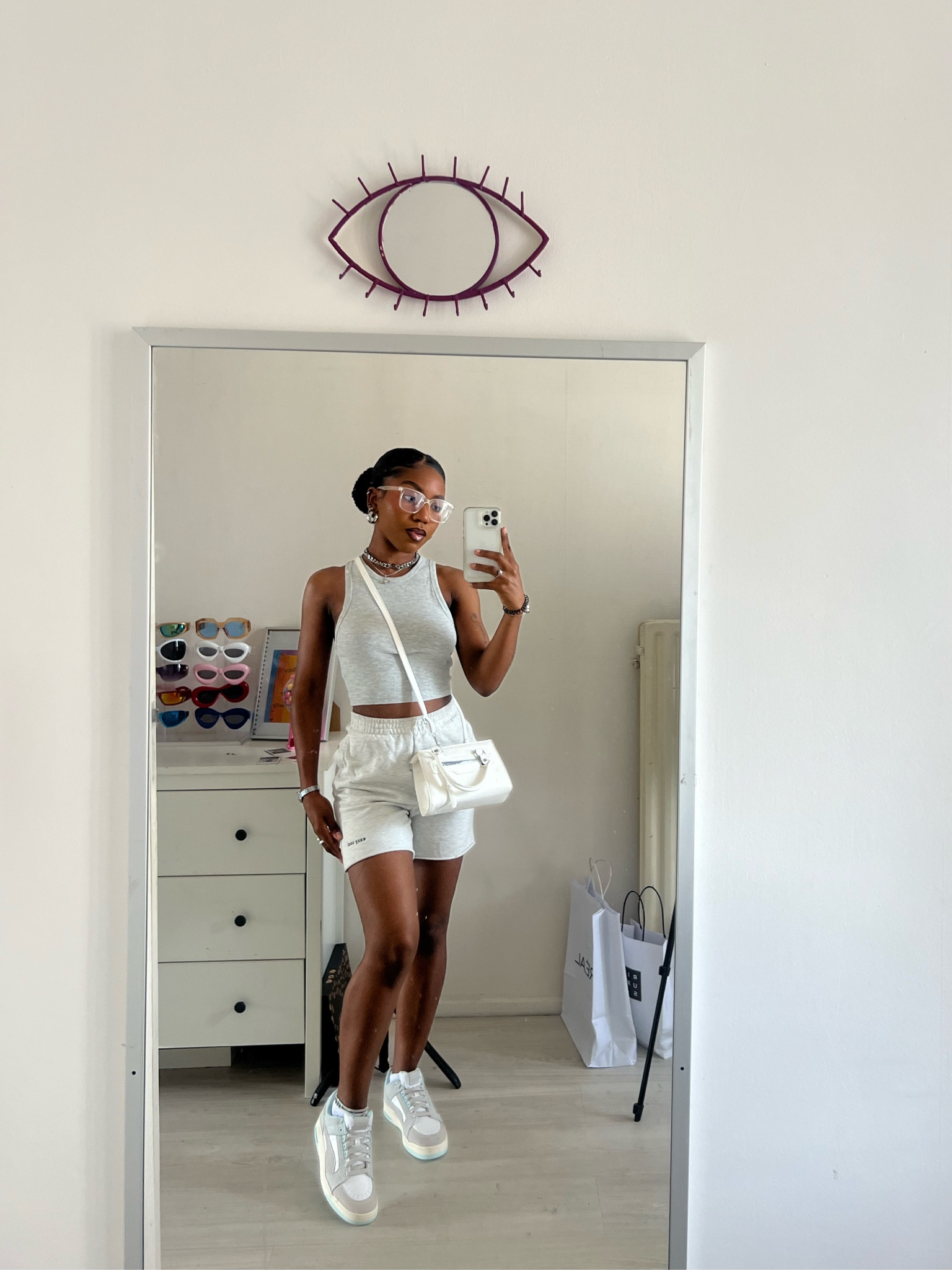 Comfortable outfit. Grey outfit. Petite fashion. SHEIN white bag. H&M grey jogging short. Zara basic top. Clear glasses. Clear sunglasses. Silver accessories. Running errands outfit. Outdoor outfit. Airport outfit. Monochromatic outfit. Monochromatic fashion. Basic tank top. Grey tank top. 

#LTKfit #LTKstyletip #LTKshoecrush