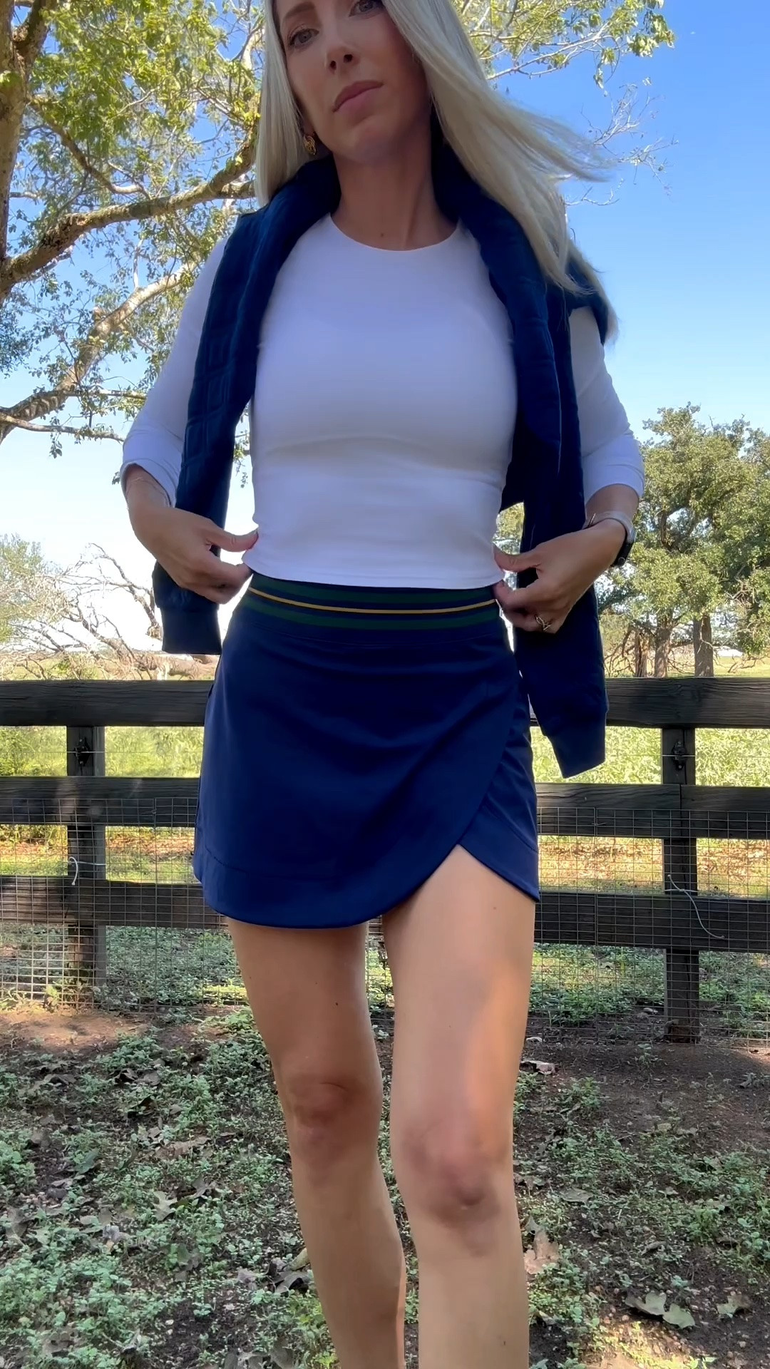 The Amazon top that every woman needs! Wearing size small. It’s the perfect athletic top, just the right length and thickness to wear with skirts or leggings. This skirt is also 10/10! Tts, wearing XS. You can definitely feel the quality with this one. White athletic top, navy sort sport skirt, tnuck sport, pickleball outfit, golfing outfit, tennis outfit. Glassalwaysfull