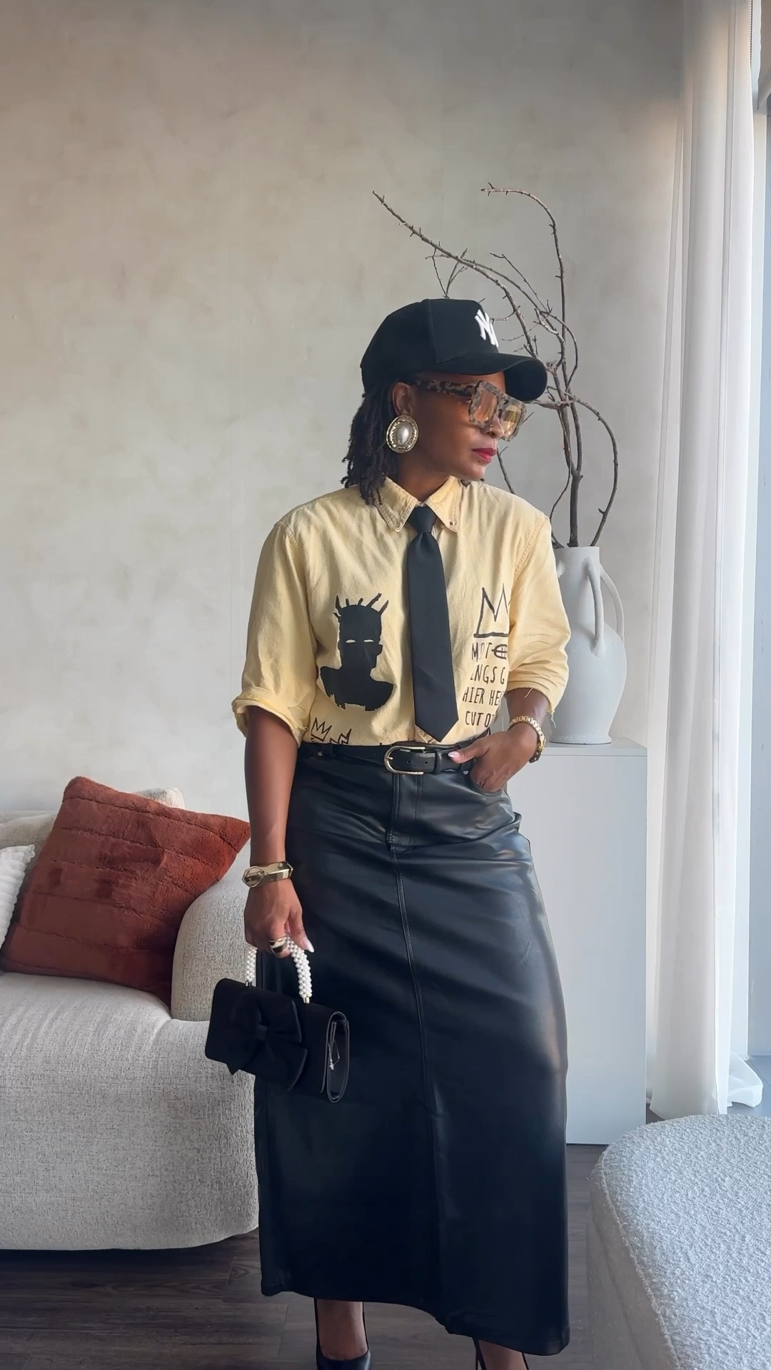 Day 10! A street chic office look for your next outing! I’m still obsessed with my Basquiat shirt from @optionshtx   Since I first got it! Felt like this tie was the perfect addition and rounded out the look with my faux leather maxi skirt I thrifted last season.

Unlinkable mentions :
Print ring from @lilmissleather
Frames : @ifyoudareaccessories


#LTKFindsUnder100 #LTKStyleTip #LTKSeasonal