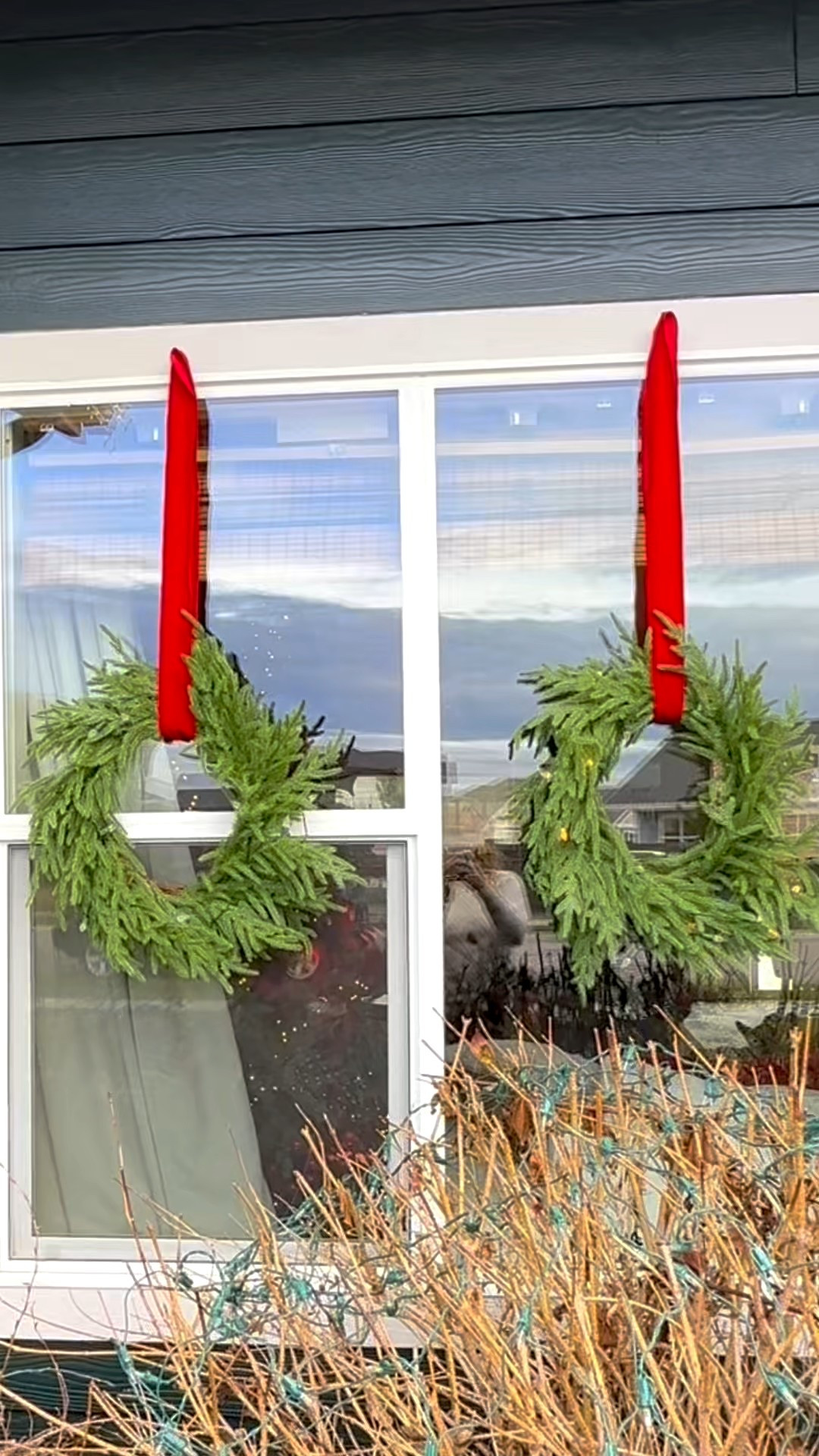 A simple little project with a big impact! I love hanging these artificial wreaths on all the front windows of my home. I light them up with battery, operated lights and they add a beautiful festive touch for the holidays. I hang them on Nails, but you could use suction cups on your windows. I've linked some below. 