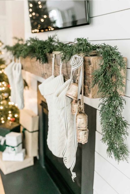 Christmas decor mantle inspiration  

Knit stockings garland jingle bells living room 

#LTKHoliday #LTKSeasonal #LTKhome