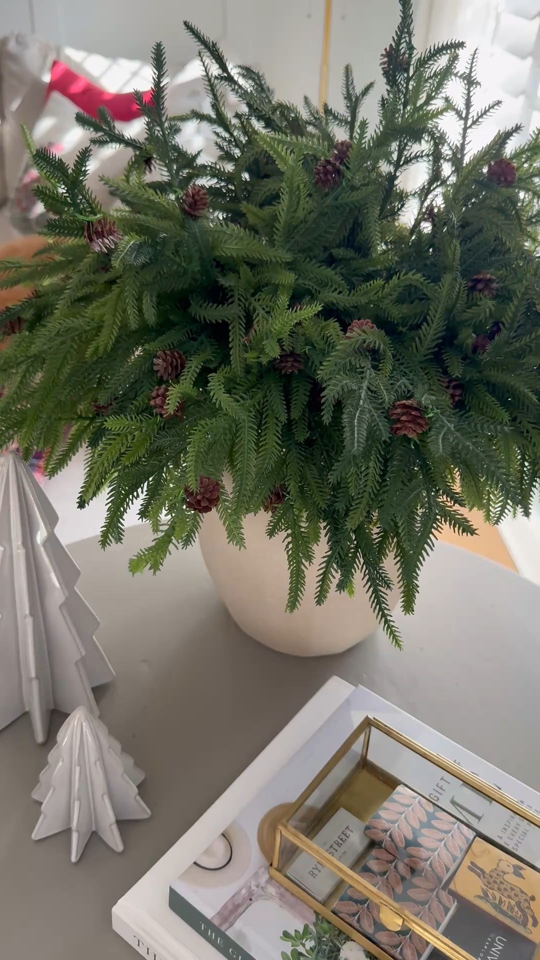 Norfolk pine branches with pine cones 
Artificial pine stem
Holiday greenery
Artificial pine branch
Glass trinket box
Tree decor
Table decor
Christmas decor
Holiday decor
Coffee table books


#LTKSeasonal #LTKHoliday #LTKHome