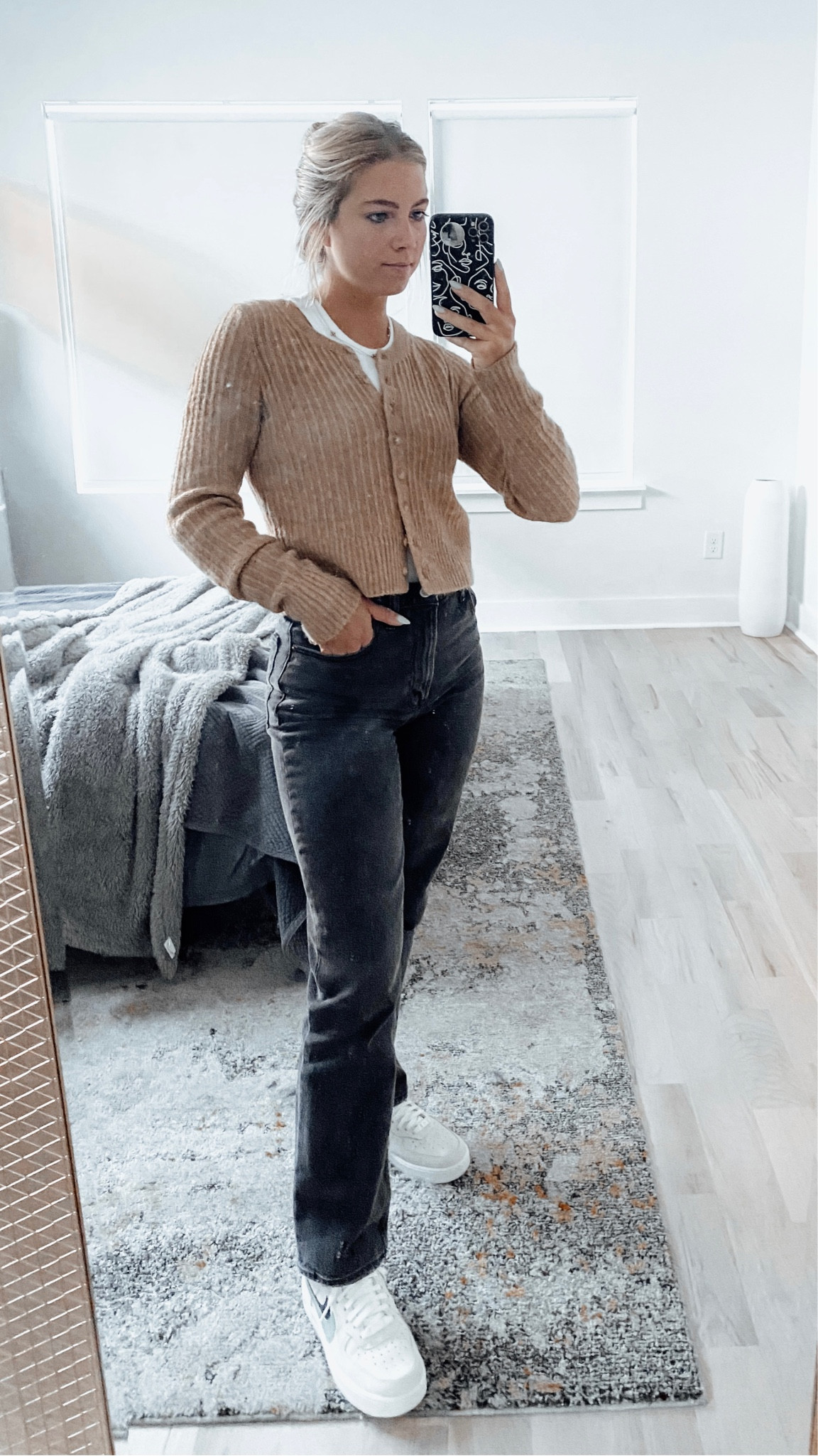 Gold cropped cardigan with black curve love Abercrombie jeans and white and green air force one’s 

#LTKworkwear #LTKshoecrush #LTKstyletip