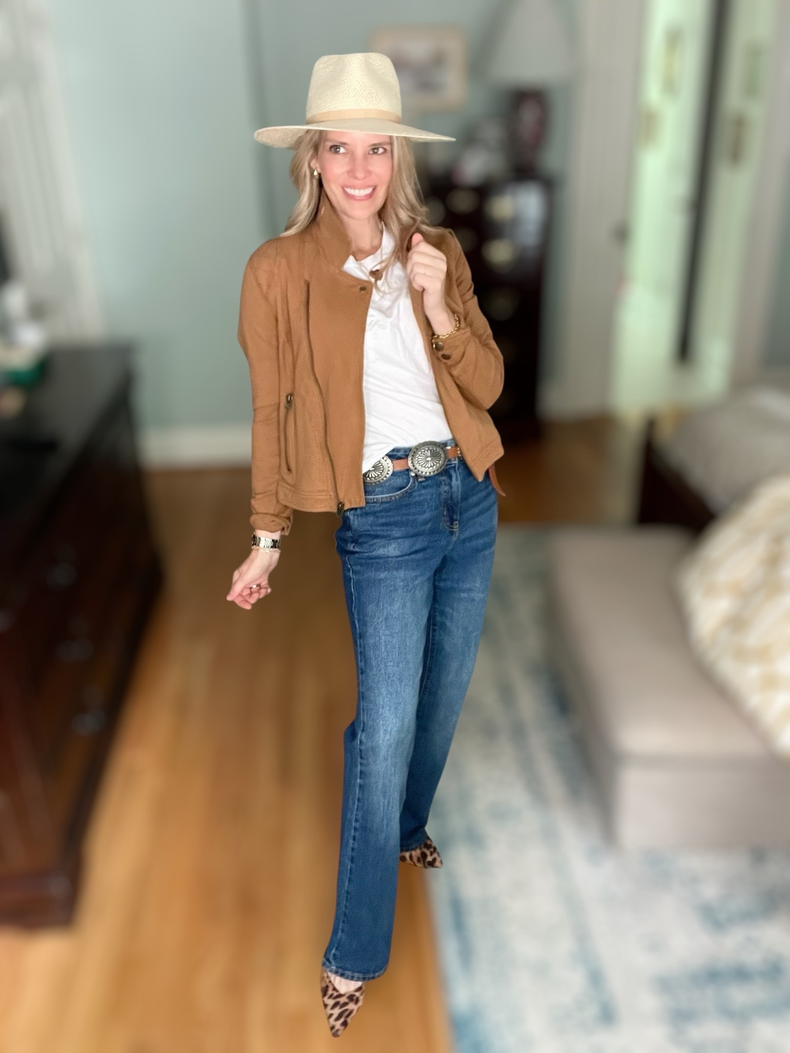 Western chic with a polished twist 🤠✨ I styled a camel suede moto jacket over a classic white tee and straight-leg denim for an effortless fall outfit. A concho western belt pulls it all together, while a straw hat adds that laid-back vibe. To finish, I went with leopard heels for a fun, feminine touch 🐆.

This look is perfect for fall outings—whether it’s a casual day in town, a fall festival, or just elevating your weekend style. Add gold jewelry and a statement watch for a little extra shine.

🛍️ Shop the full outfit here:
	•	Amazon camel moto jacket
	•	Walmart Free Assembly denim
	•	Walmart Time & Tru tee
	•	Janessa Leone straw hat
	•	Amazon concho western belt
	•	Sam Edelman leopard pumps / Macy’s leopard pumps
	•	Abbott Lyon watch + Ahava jewelry

⸻

fall western outfit, western chic style, camel moto jacket outfit, fall casual chic, Walmart fall fashion, leopard heels outfit, Janessa Leone hat, Abbott Lyon jewelry, Ahava tennis bracelet, concho belt outfit, modern western fashion, fall outfit inspiration


#LTKSaleAlert #LTKFindsUnder100 #LTKFindsUnder50