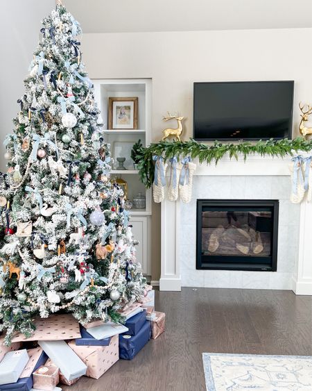 White flocked 9’ foot Christmas tree Walmart garland gold reindeer decor white cream knit stockings blue ribbon coastal grandmillenial French country

#LTKhome #LTKHoliday #LTKSeasonal