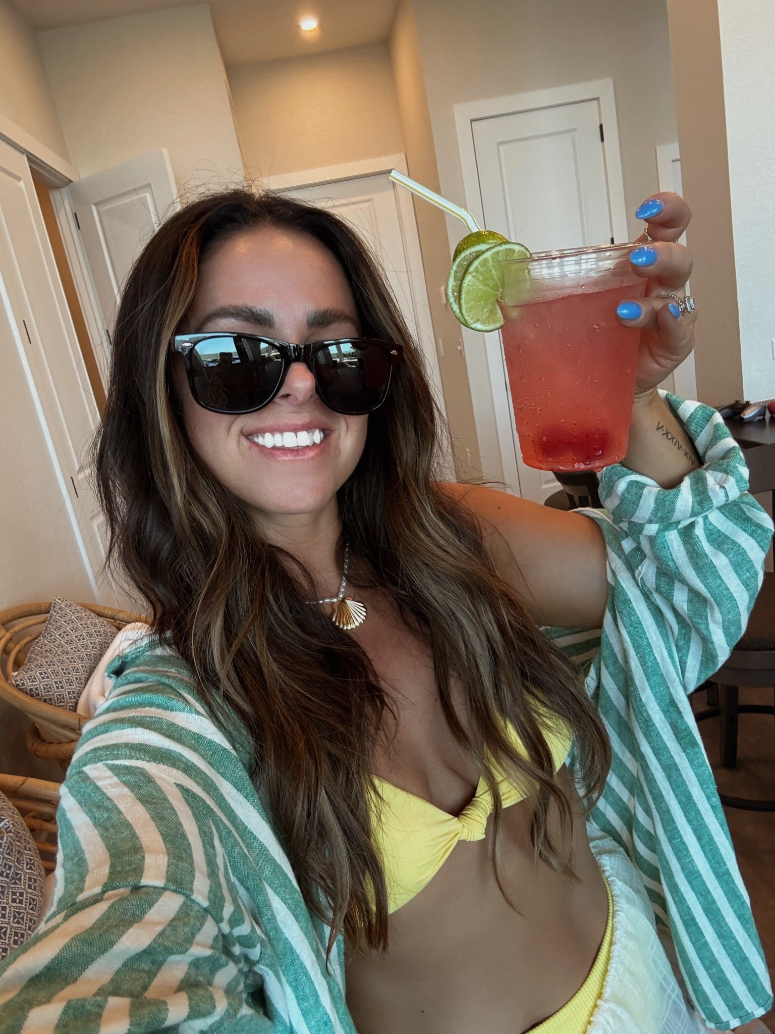 Spring break pool outfit! 🍹☀️
Yellow bikini
Green stripe button down 
Wearing smalls 

#LTKTravel #LTKootd #LTKSeasonal