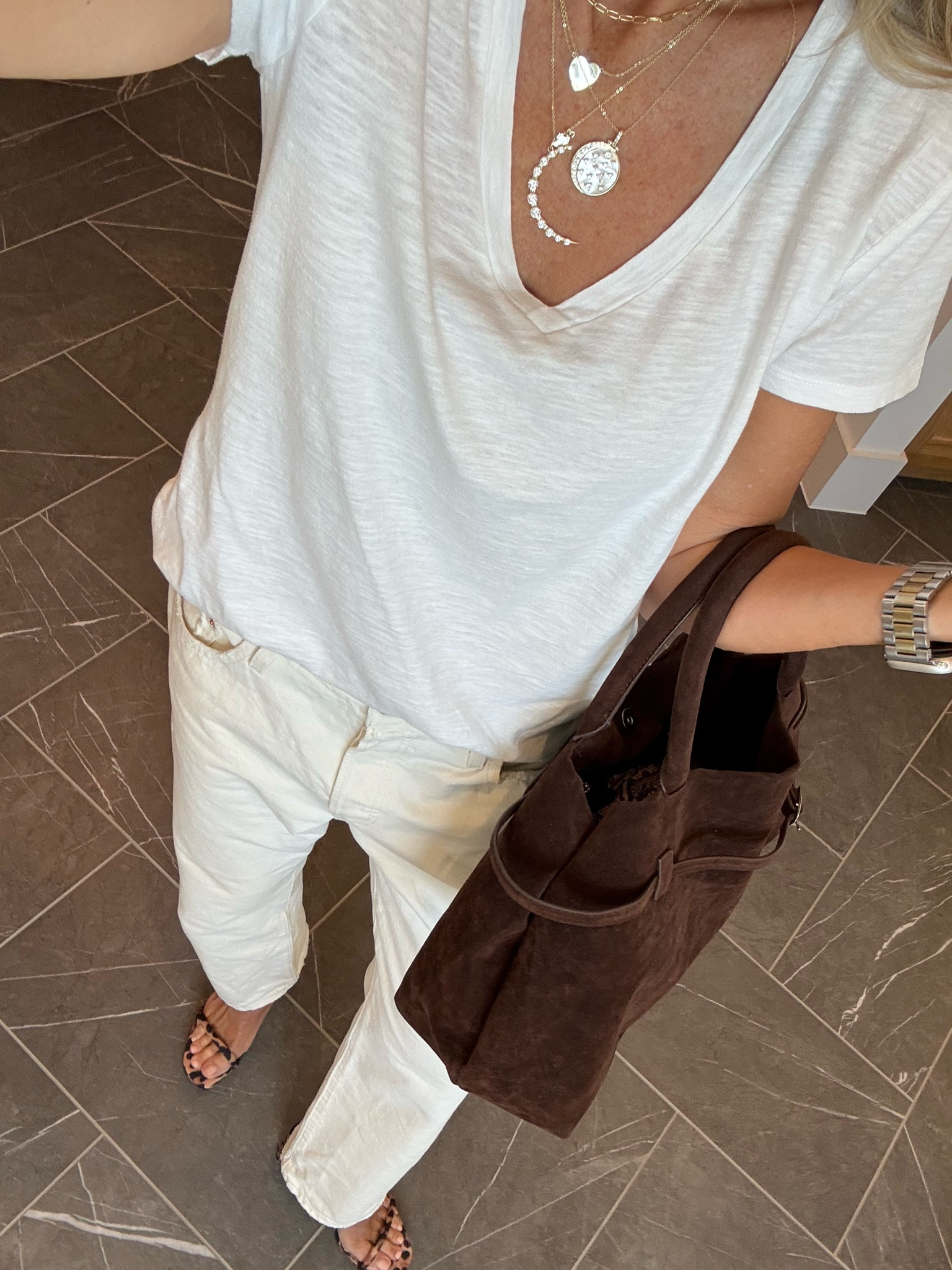 Simple. 

T-shirt is target; wearing medium - suggest to size up if you want relaxed fit

Jeans: I sized up for relaxed fit; can literally pull them straight down without unbuttoning — and I like the look; but if you want more of a fit, go with reg size

Bag: love this look-for-less

Shoes are Zara but I’ve linked more

Jewelry - Melinda Maria; use promo code StephanieF to save sitewide; makes the BEST gifts too!!! Right now there’s a promo too!! If you spend $98, you will receive 2 pairs of huggies!! Suggest to shop quickly while supplies last  

#LTKSeasonal #LTKFindsUnder100 #LTKItBag