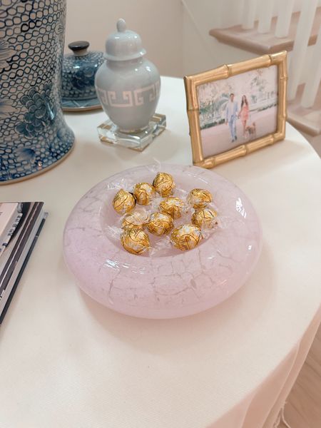 Prettiest pink candy dish! It’s Italian hand blown glass and is so beautiful styled here with white chocolate truffles at our entry table for Valentines home decor  

#LTKFind #LTKstyletip #LTKhome