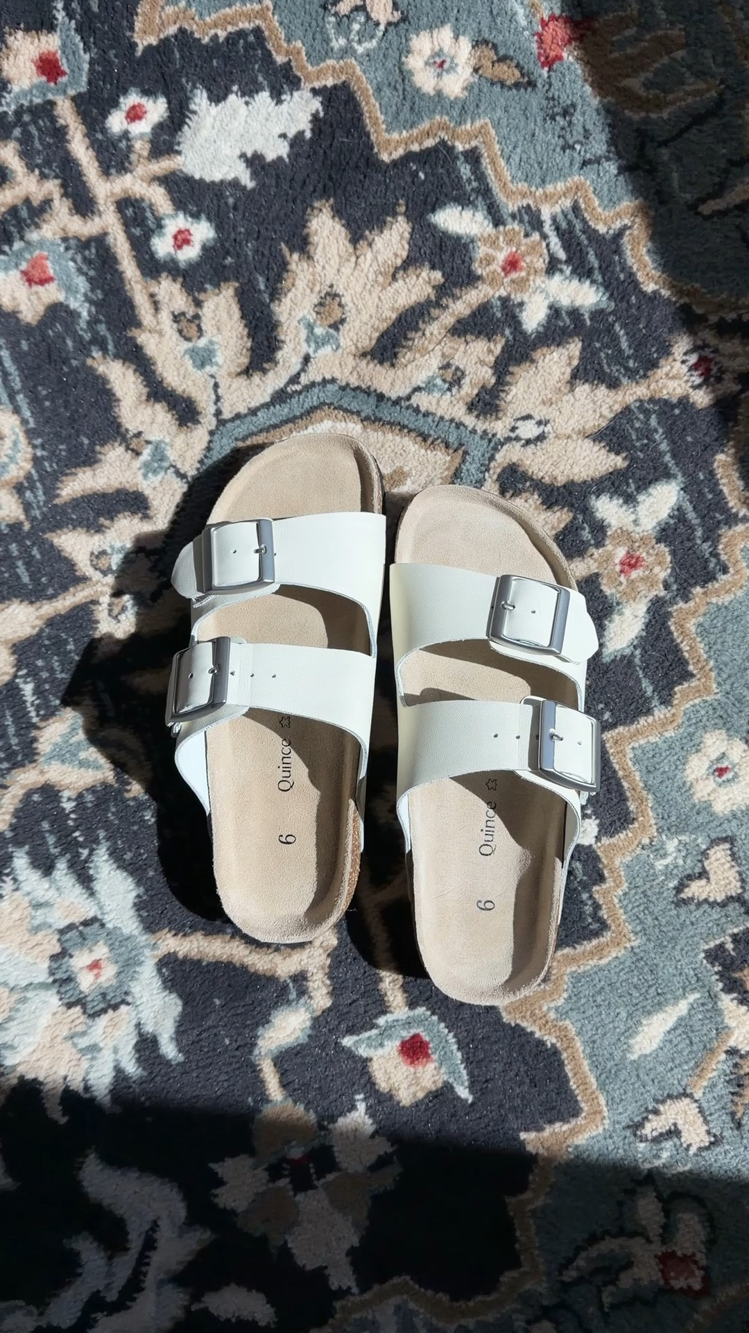 Had to share these Quince Nappa Leather Double Buckle Slides in Bone because they are so good! 🌿👡 They are incredibly comfortable and fit my size 6 wide feet perfectly which is not always easy to find in a slide sandal. The leather is so soft and the double buckle detail is so chic. These are giving all the elevated effortless vibes for spring and summer. If you have been eyeing Birkenstocks these are a beautiful alternative at a much better price point and honestly I think the quality and comfort are right there with them. I am so happy with this find and they go with absolutely everything. Linked in my LTK shop! 🛒 

 #LTKootd #LTKOver40 #LTKTravel