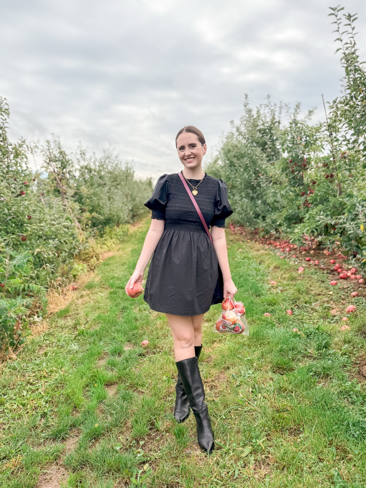 Hill House Home smocked puff sleeve black cotton Vivi mini dress, black leather boots, Brinker & Eliza the best is yet to come necklace 

Fall outfit, autumn, grand millennial, fall style, little black dress, under $200, feminine, apple orchard 

#LTKSeasonal