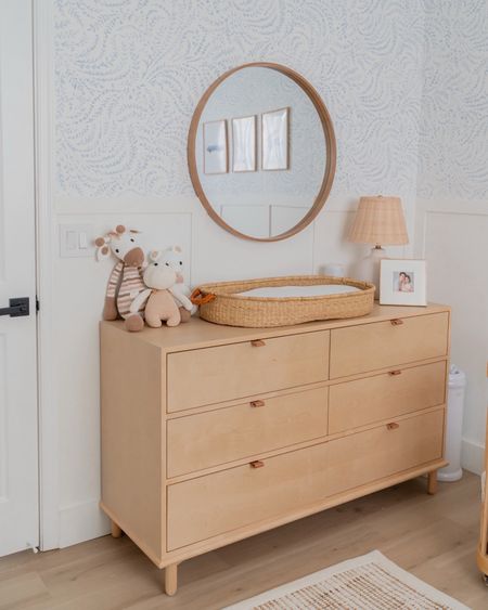Nursery room inspo you can copy: wooden drawer dresser, round framed mirror, rattan lamp, and more!
#affordablefinds #homerenovation #neutralaesthetic #designtips

#LTKSeasonal #LTKhome #LTKstyletip