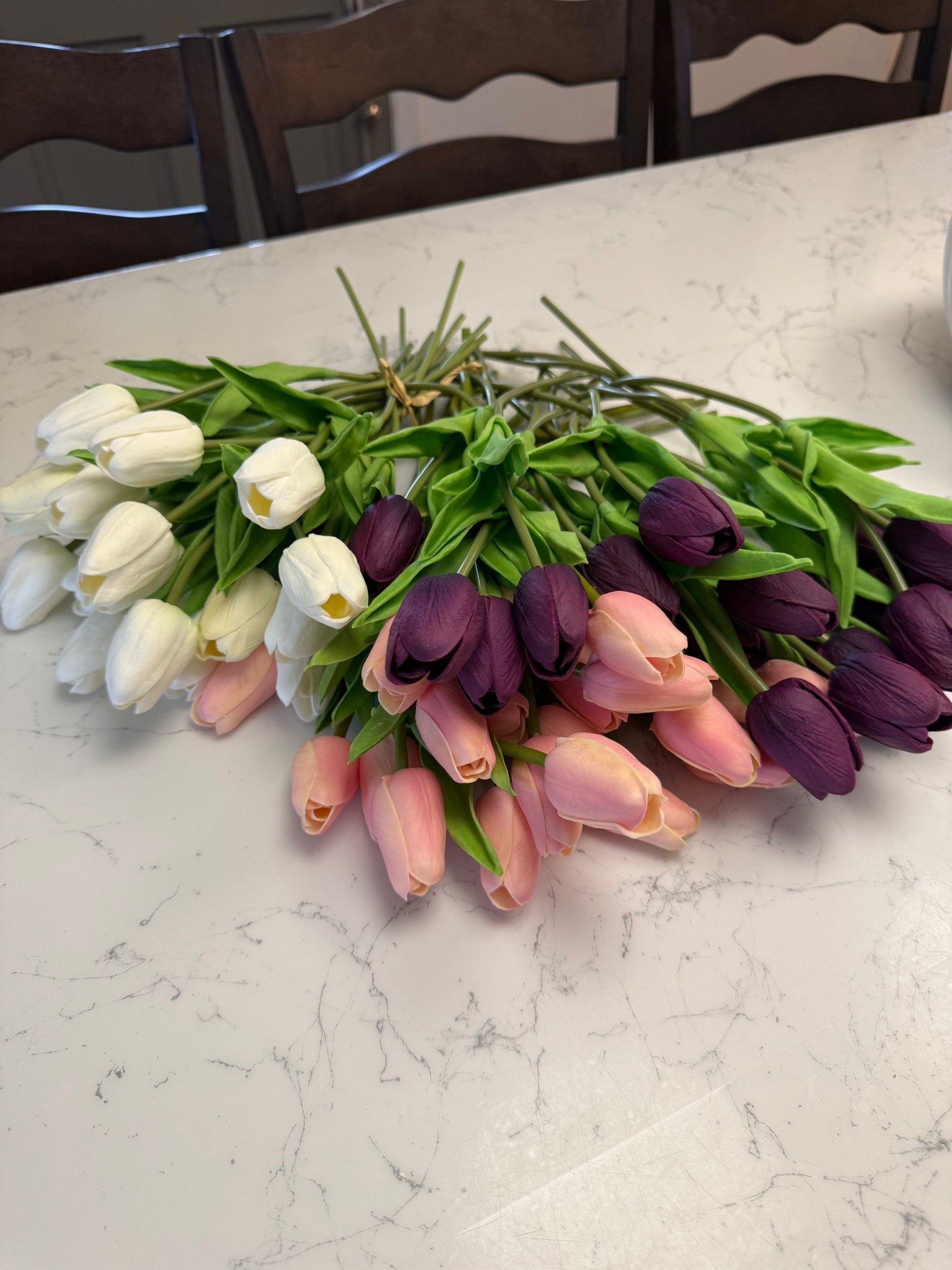 Faux tulips that look and feel realistic - I had had some of mine since 2019! 
Multiple color choices 

#LTKfindsunder50 #LTKhome #LTKsalealert