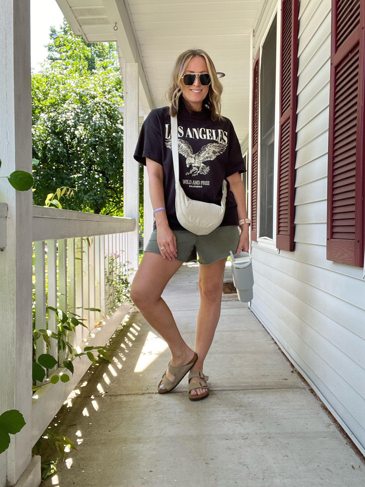 Everyday tee. Everyday outfits. Easy outfits. Easy outfit ideas. Neutral basics. Spring outfit. Spring outfit idea. Summer outfit. Summer outfit idea. Casual outfits. Basic mom outfit. Casual outfit idea. Casual outfit. Everyday outfit. Mom outfit. Church outfit. Basic t-shirt. Basic tee. Graphic tee. Sweat shorts. Birkenstock sandals. Sunglasses. Bum bag. Crossbody bag. Stanley.

#LTKFindsUnder50 #LTKFindsUnder100 #LTKSeasonal