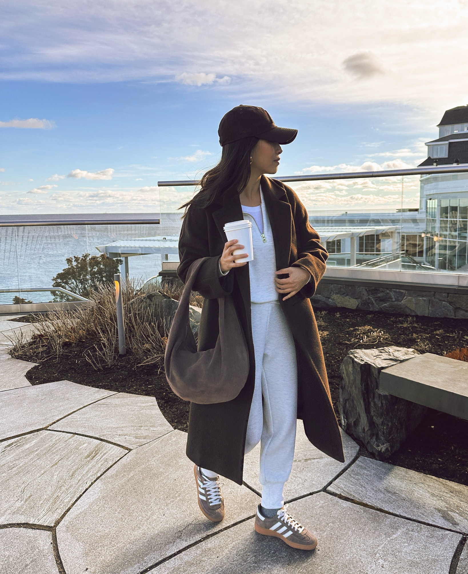 Elevated casual winter outfit. For travel, running errands, lounging 

• adidas Spezial sneakers back in stock in my exact color Earth Strata brown. Comfortable and supportive, runs big. I have size 5 with room to spare 

• Etsy suede hobo bag in Corteccia color, medium size . Perfect slouch, very comfy over the shoulder. They gave me code JEANHOBOBAGS30 ends Feb!

• Varley The Slim Cuff Joggers in ivory marl xxs. 25” is very petite friendly on me. You can get the longer length (separate product listing) if you are taller and don’t want a cropped style.

• Varley Davidson woven sweatshirt in ivory marl xxs. Double soft material is the best and worth it IMO!

• Aritzia slouch coat xxs short (petite) - very warm, runs big with an oversized fit. Linked a color stocked in petites!

• Quince cashmere socks 

• Aritzia baseball cap 

• New Balance 530s - I have the kids version size 3.5, can also fit women’s 5

Casual Athleisure outfits, petite friendly winter outfits, errands 

#LTKItBag #LTKTravel #LTKShoeCrush