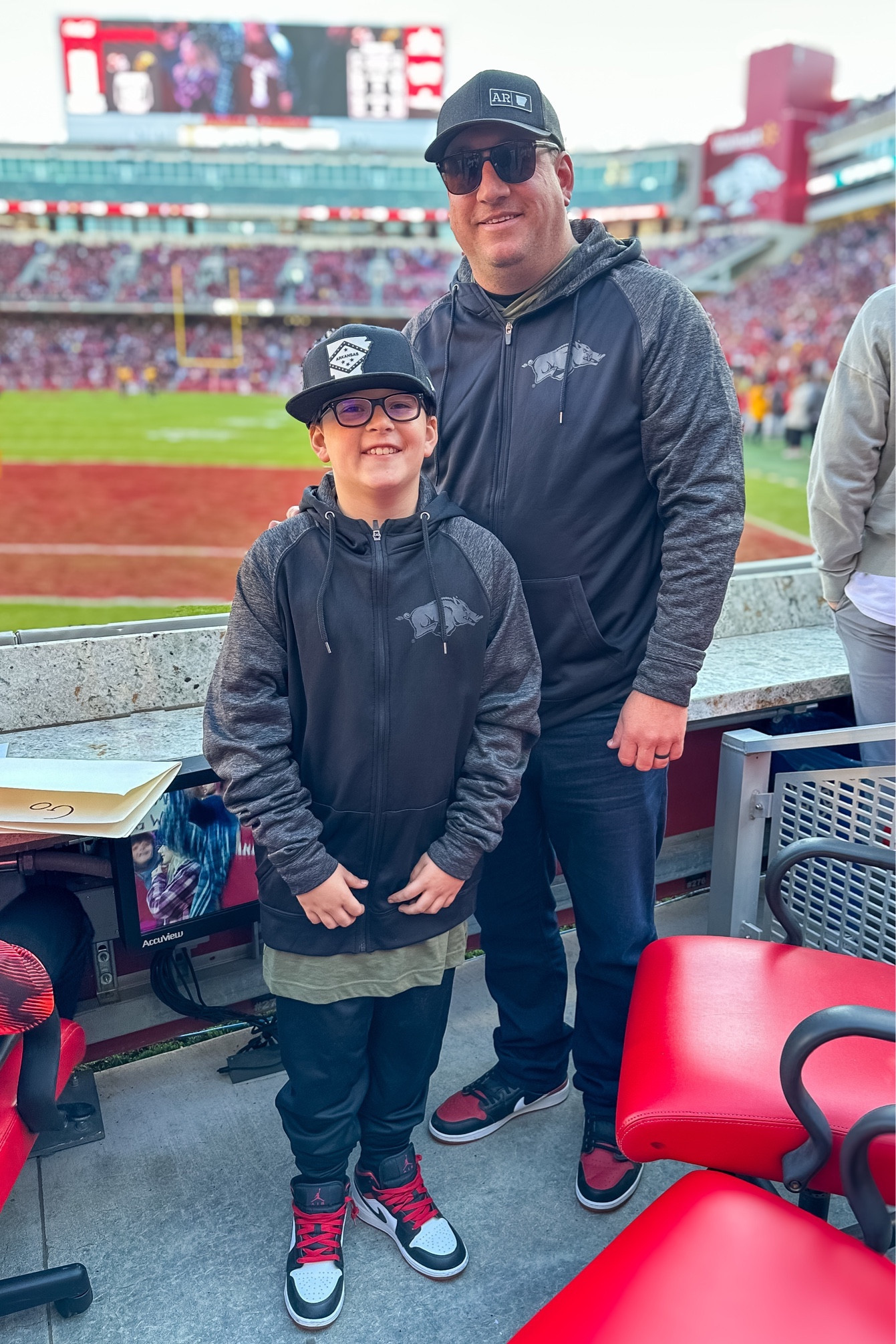 Father-son bond: Unmatched loyalty, matching gear, and endless cheers for the Razorbacks, creating priceless memories regardless of the score. 🐗🏈 #TeamSpirit #FamilyFirst almost all of their gear is on sale during cyber week!  Grab it on sale while you can! 

#LTKfamily #LTKsalealert #LTKCyberWeek