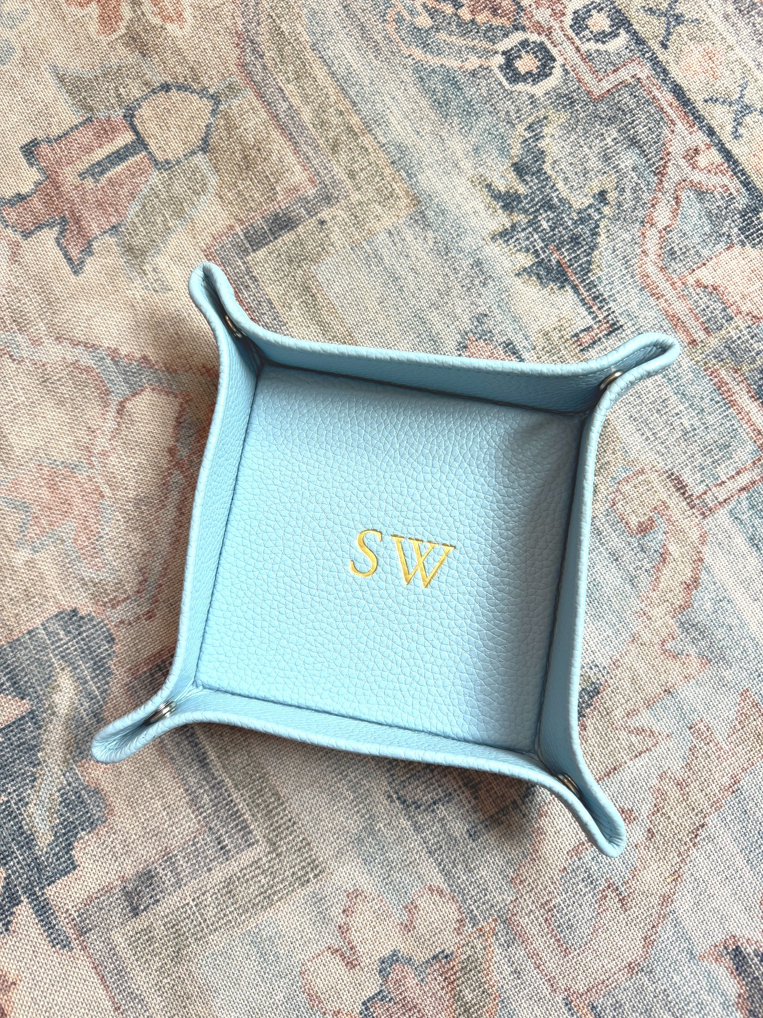 Leather personalized catchall tray unsnaps completely flat for travel. Corral all your must-have items safely so they don’t get lost and you have easy access. Makes a perfect Mother’s Day, Graduation, or Wedding Party Gift!



#LTKMothersDay #LTKWedding #LTKOver40