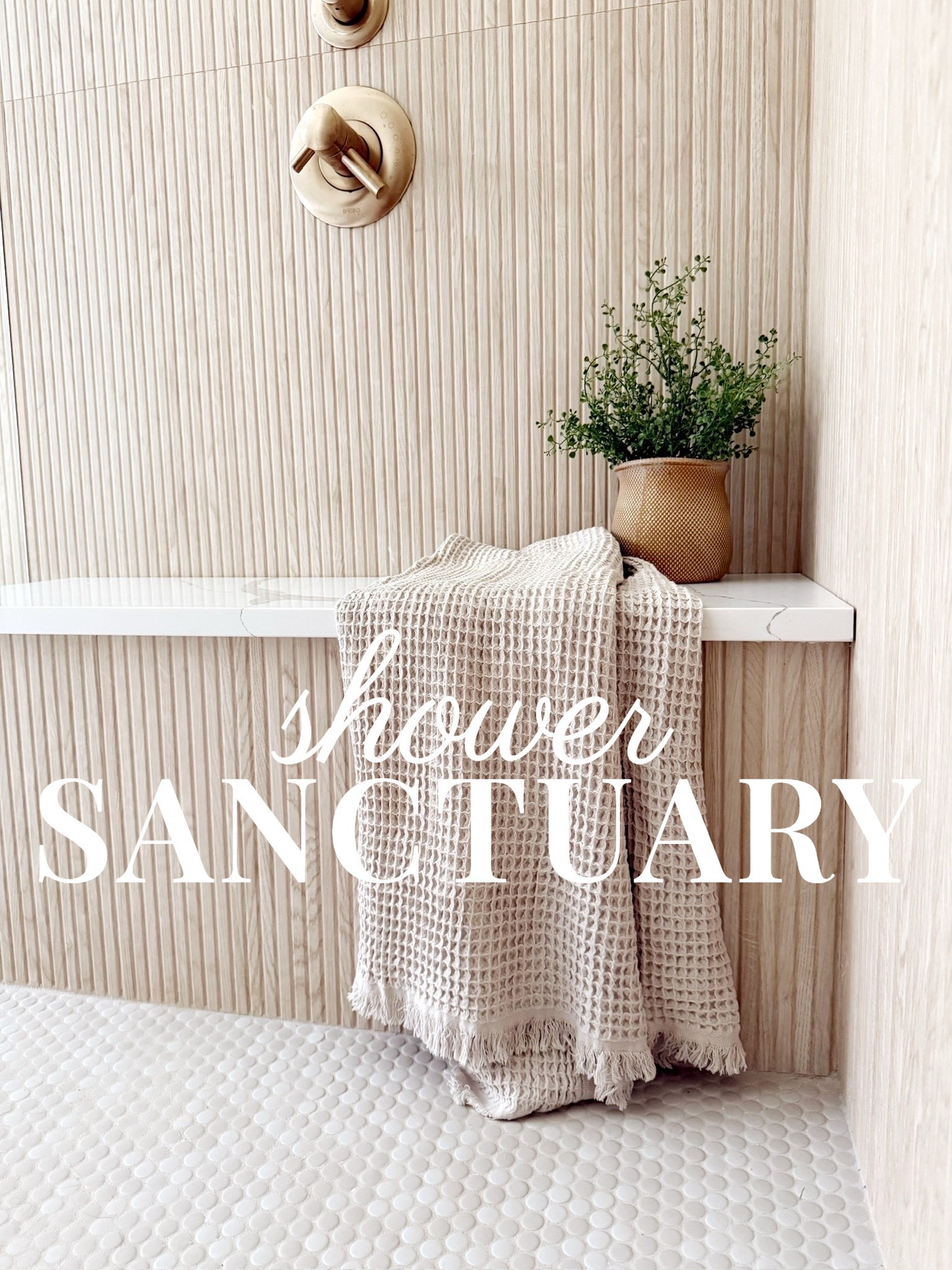 Bringing spa vibes home 🤍🚿 This neutral shower nook is all about texture and tone—brushed brass fixtures, fluted wall tile, a waffle weave towel, and a touch of greenery to soften the space 🌿✨ Clean, calming, and oh-so-stylish. #porcheandco

#bathroomdesign #neutraltile #brassfixtures #showerstyling #modernbathroom #texturedtile #waffleweavetowel #spaathome #calmspace #cozybathvibes #ltkhome #porcheandco #interiorinspo


#LTKOver40 #LTKHome #LTKStyleTip