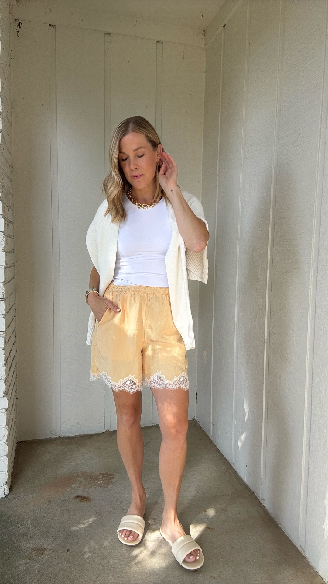 Jcrew lace shorts 50% off. Wearing a size small. Run slightly big but I did not size down. Aritzia tee size medium. Quince sweater. I sized up to a medium. Beek sandals. Sézane gold necklace. 

#falloutfit #transitionoutfit #fall #sweater #trending 

#LTKStyleTip #LTKSaleAlert #LTKOver40