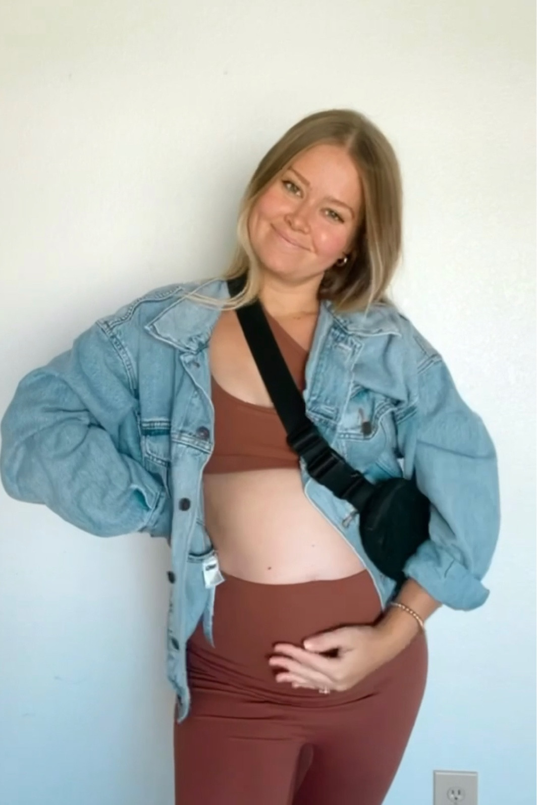 Workout set is from axkmaternity!! 
Jacket is Levi’s, belt bag is lululemon 
Wearing uggs 

#LTKfamily #LTKbump #LTKbaby