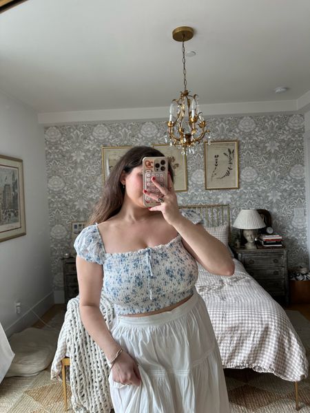 Blue toile floral smocked crop top from garage wearing a size M and my skirt is from doen

#LTKfindsunder50 #LTKstyletip #LTKmidsize
